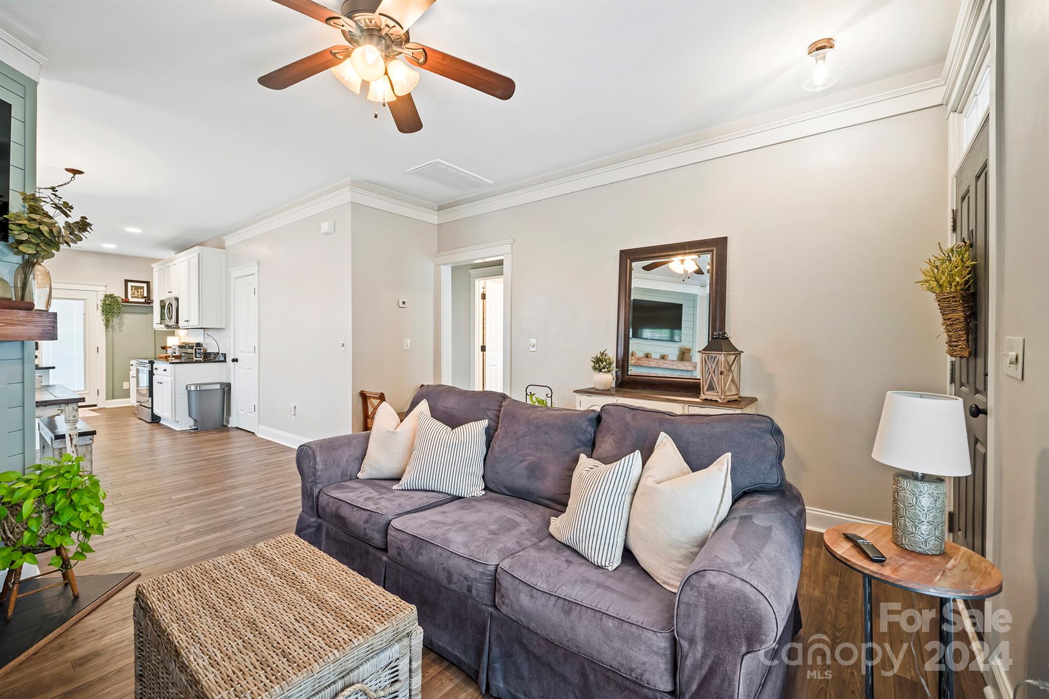 13516 Stumptown Road Huntersville, NC 28078 - Photo 6 of 37 a living room with furniture and a wooden floor