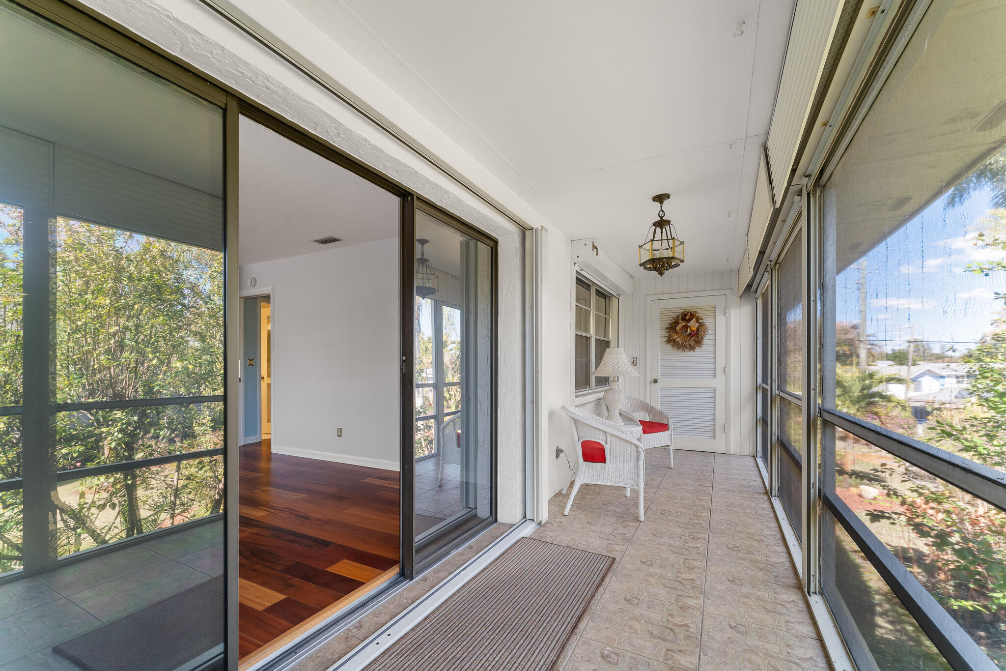 939 Northwest 11th Terrace, Unit 4 Stuart, FL 34994 - Photo 22 of 44 File.23 Back Patio w/Storage Closet