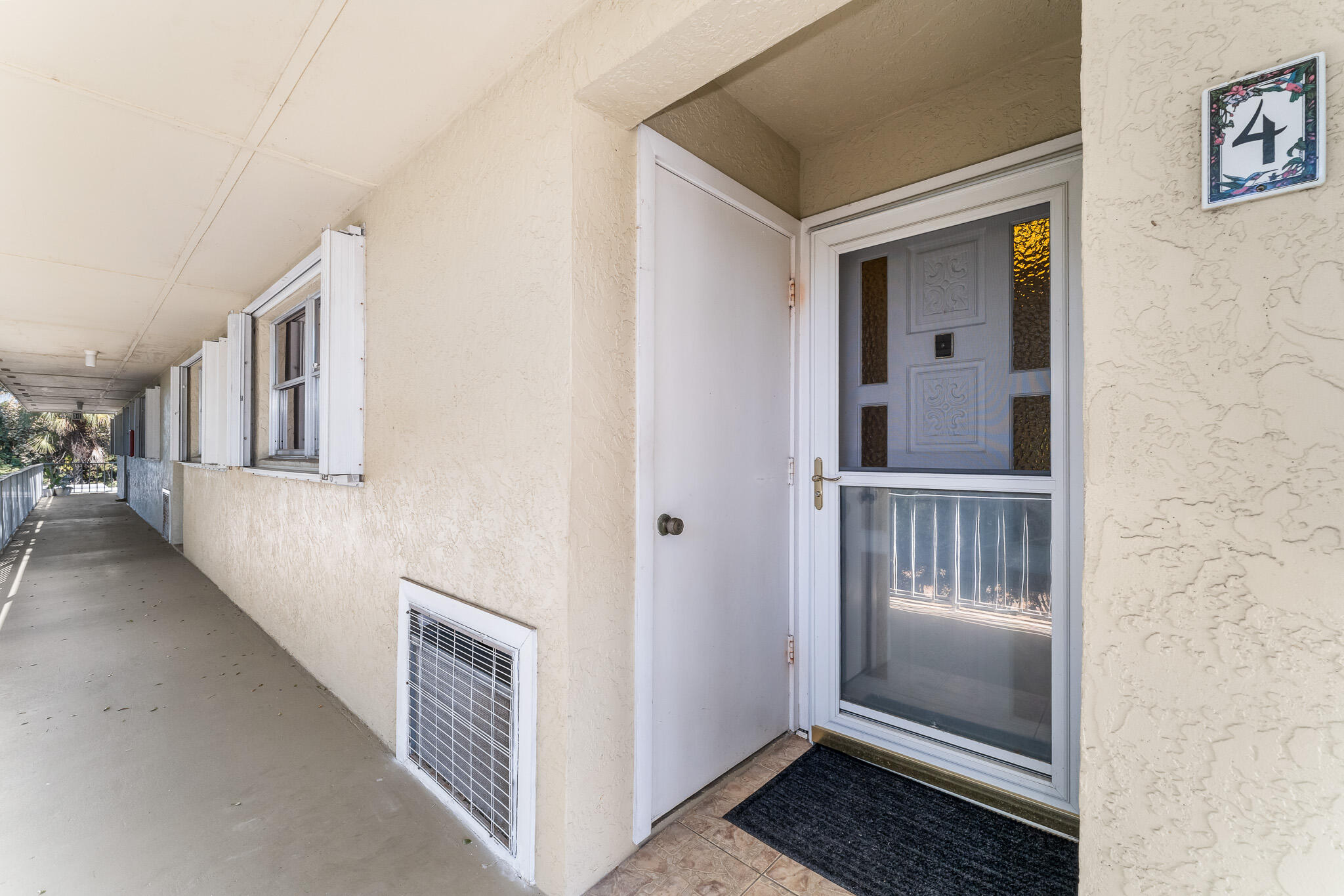 939 Northwest 11th Terrace, Unit 4 Stuart, FL 34994 - Photo 4 of 44 File.3 Front Door