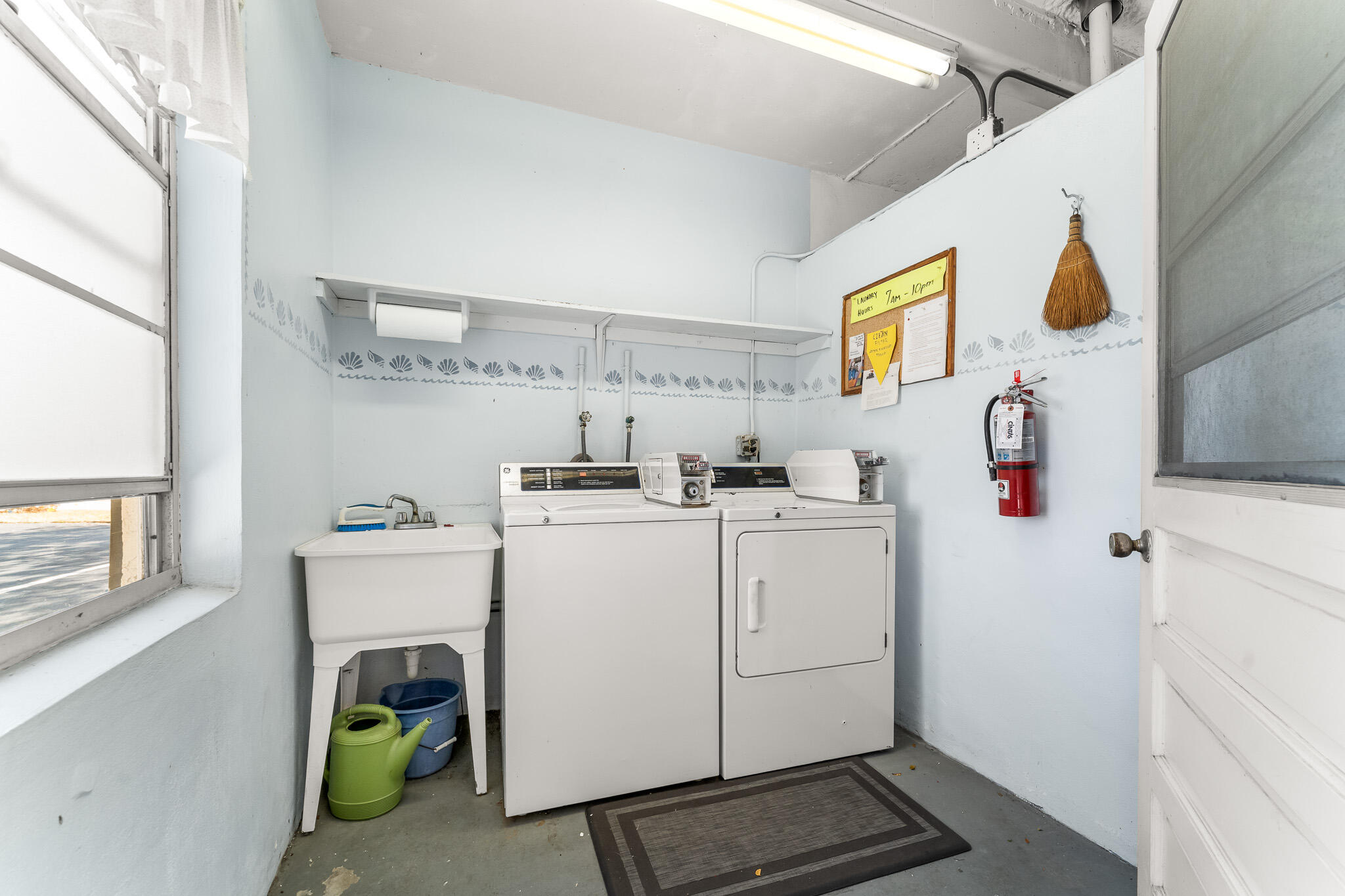 939 Northwest 11th Terrace, Unit 4 Stuart, FL 34994 - Photo 44 of 44 File.50 Common Laundry