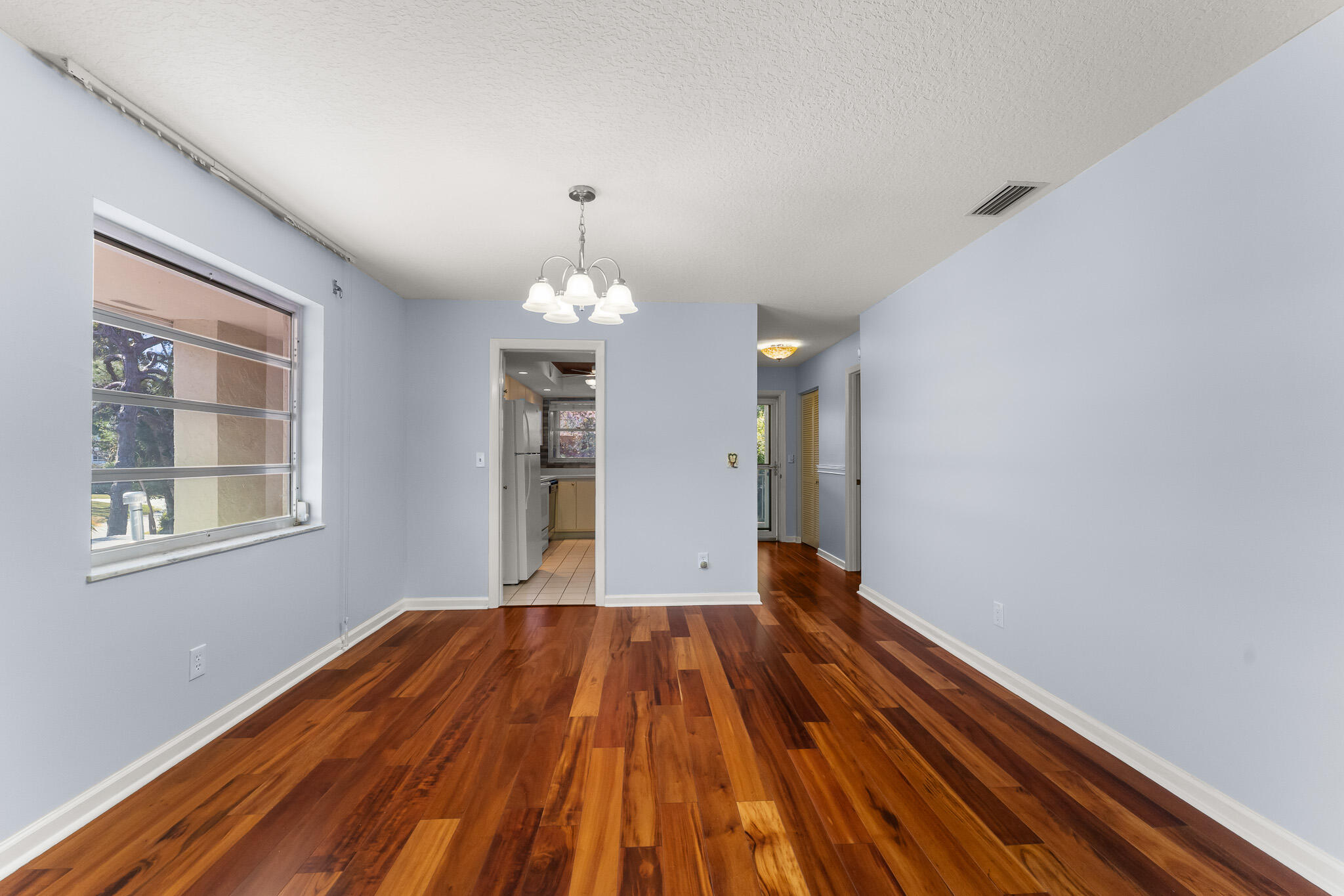 939 Northwest 11th Terrace, Unit 4 Stuart, FL 34994 - Photo 9 of 44 File.8 Close up living:dining:kit