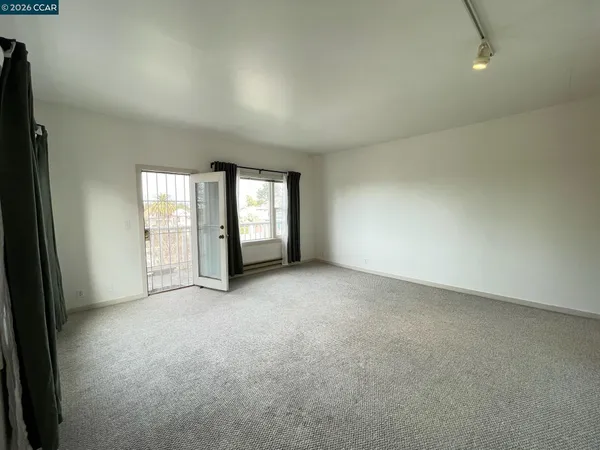 an empty room with windows