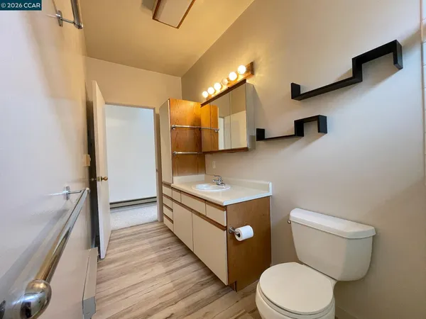 a bathroom with a toilet a sink and a bathtub