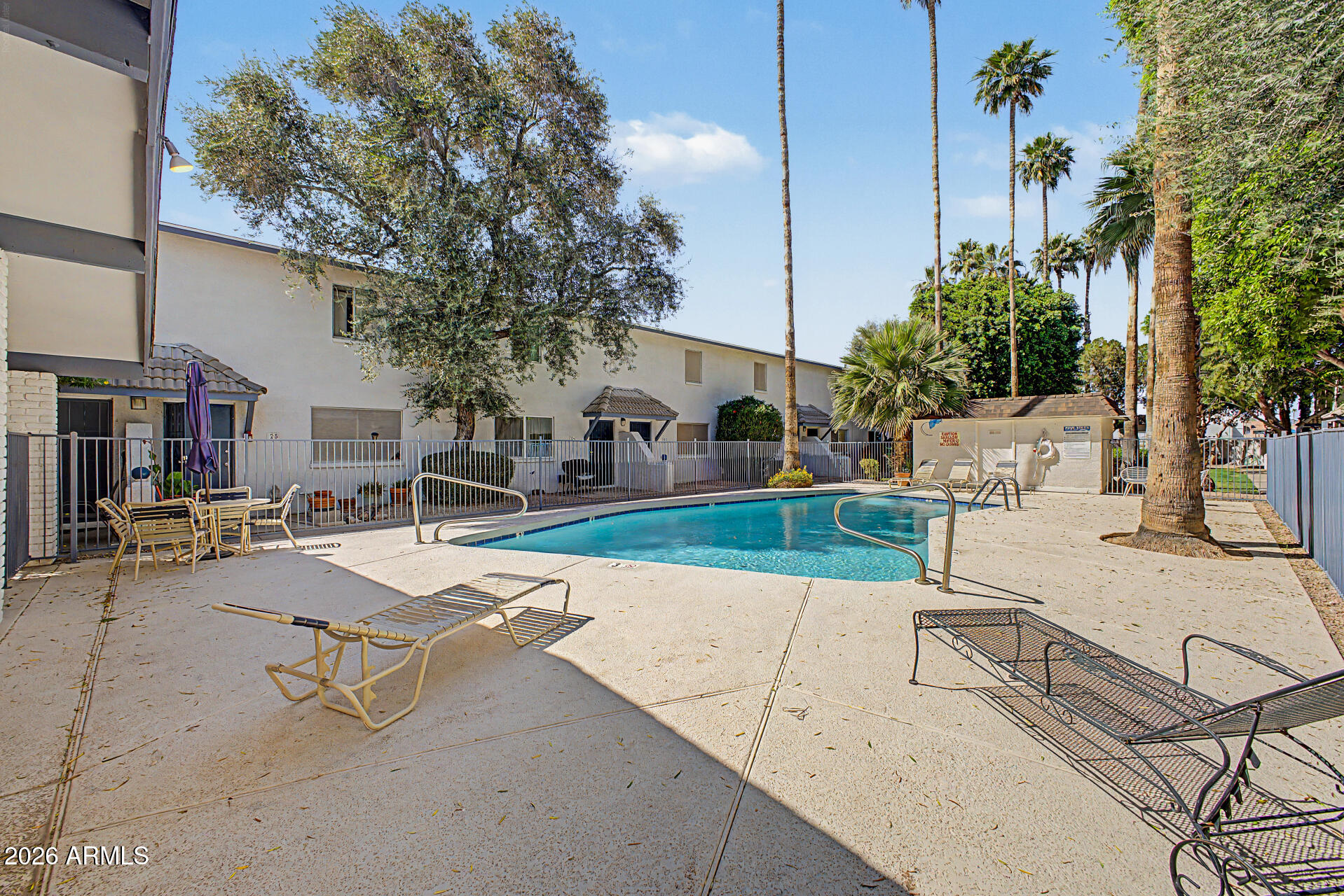 1531 West Colter Street, Unit 1 Phoenix, AZ 85015 - Photo 16 of 22 a view of a patio with swimming pool