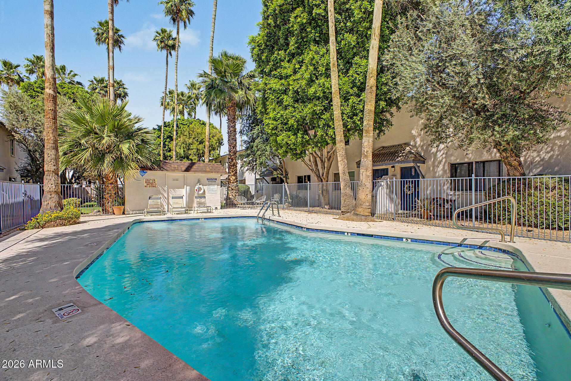 1531 West Colter Street, Unit 1 Phoenix, AZ 85015 - Photo 18 of 22 a view of a swimming pool with a patio