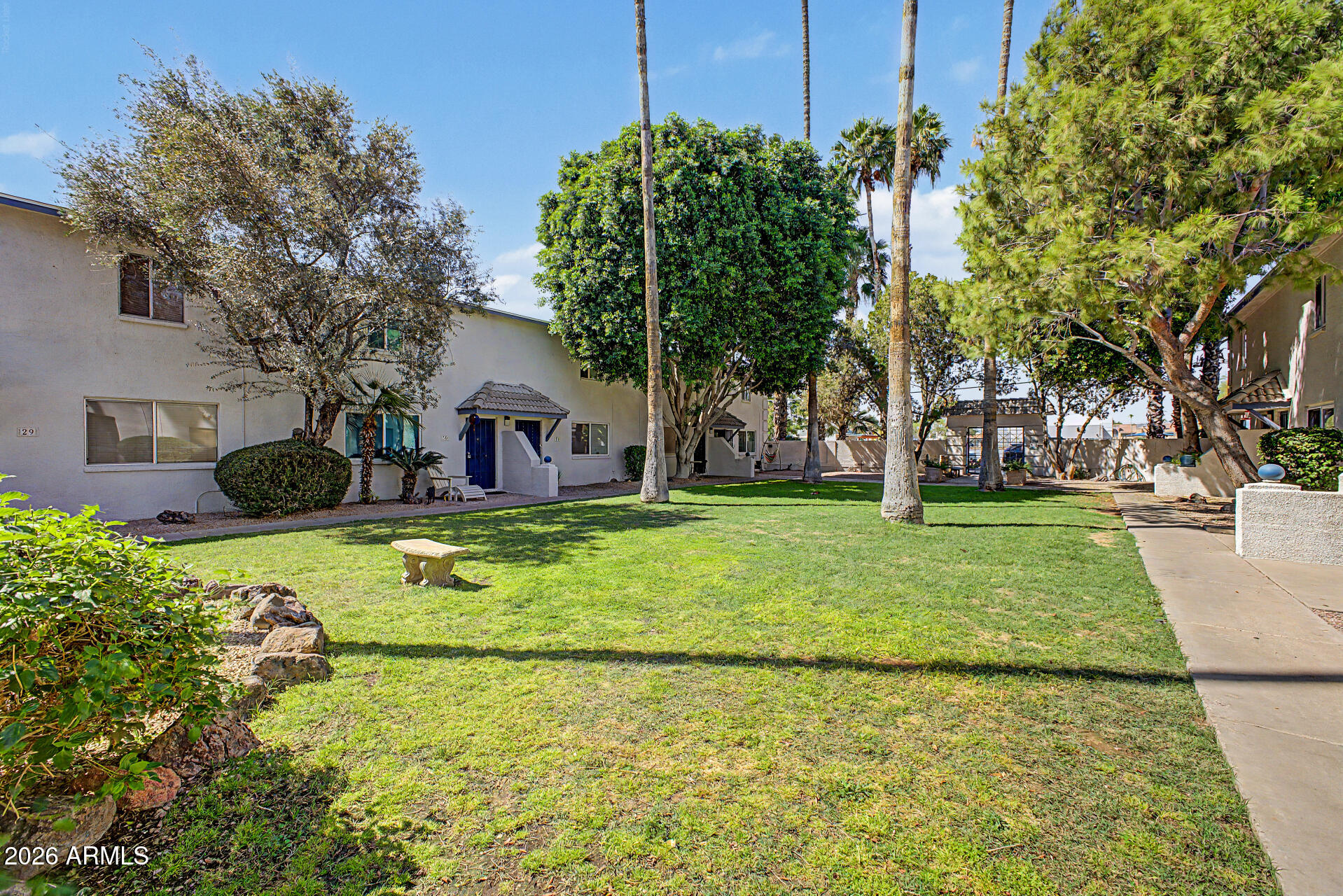1531 West Colter Street, Unit 1 Phoenix, AZ 85015 - Photo 19 of 22 a front view of a house with garden
