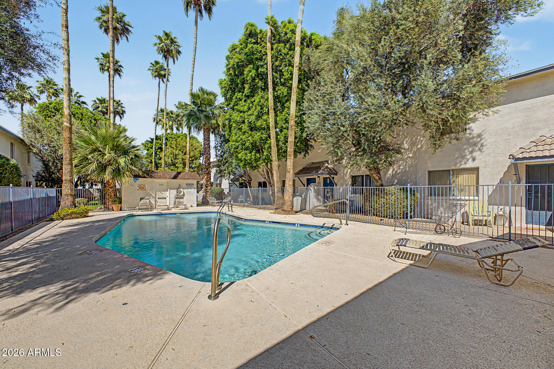 1531 West Colter Street, Unit 1 Phoenix, AZ 85015 - Photo 20 of 22 a view of a swimming pool with a patio