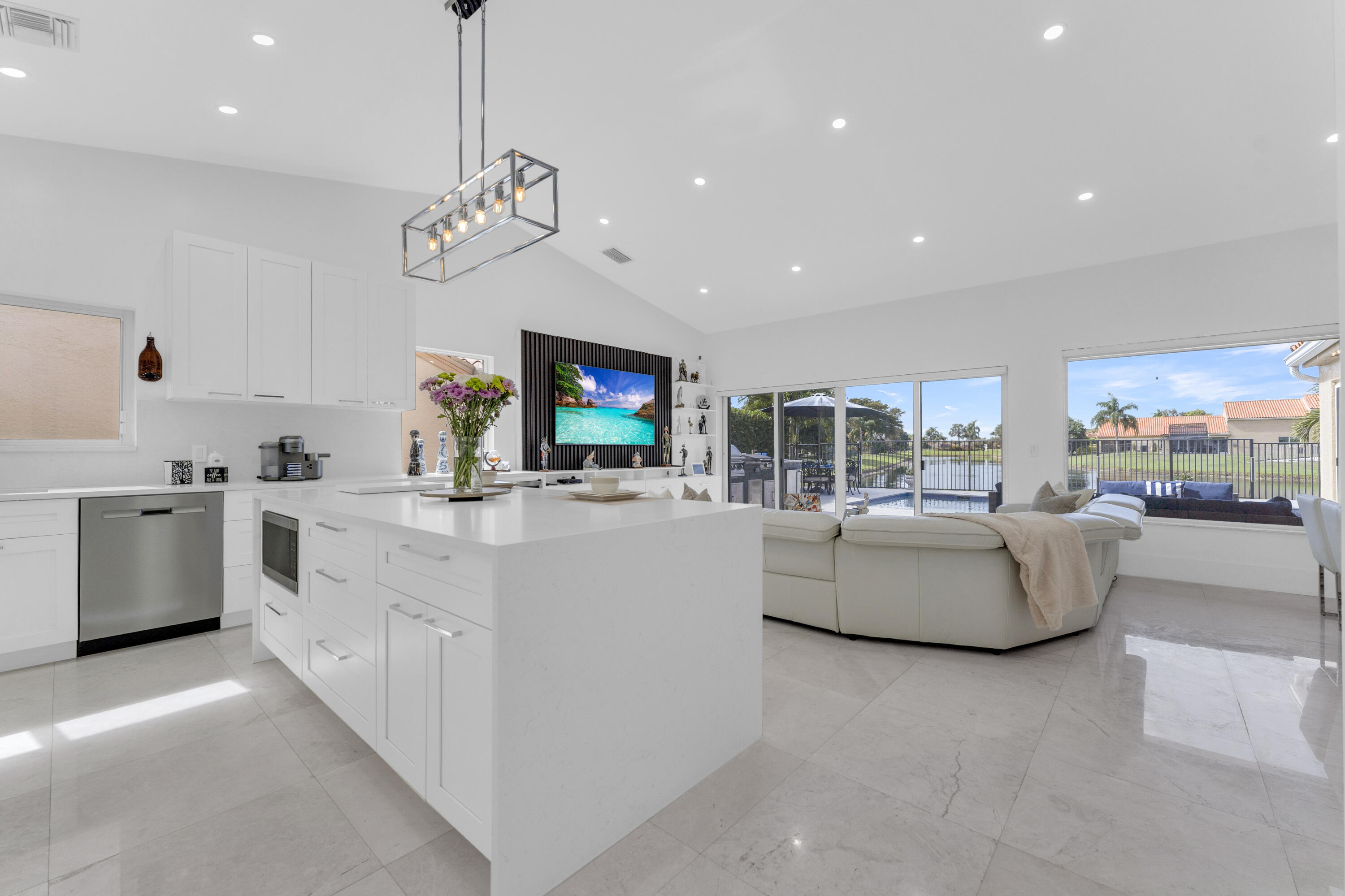 8024 Copenhagen Way Boca Raton, FL 33434 - Photo 13 of 69 a living room with furniture and a flat screen tv