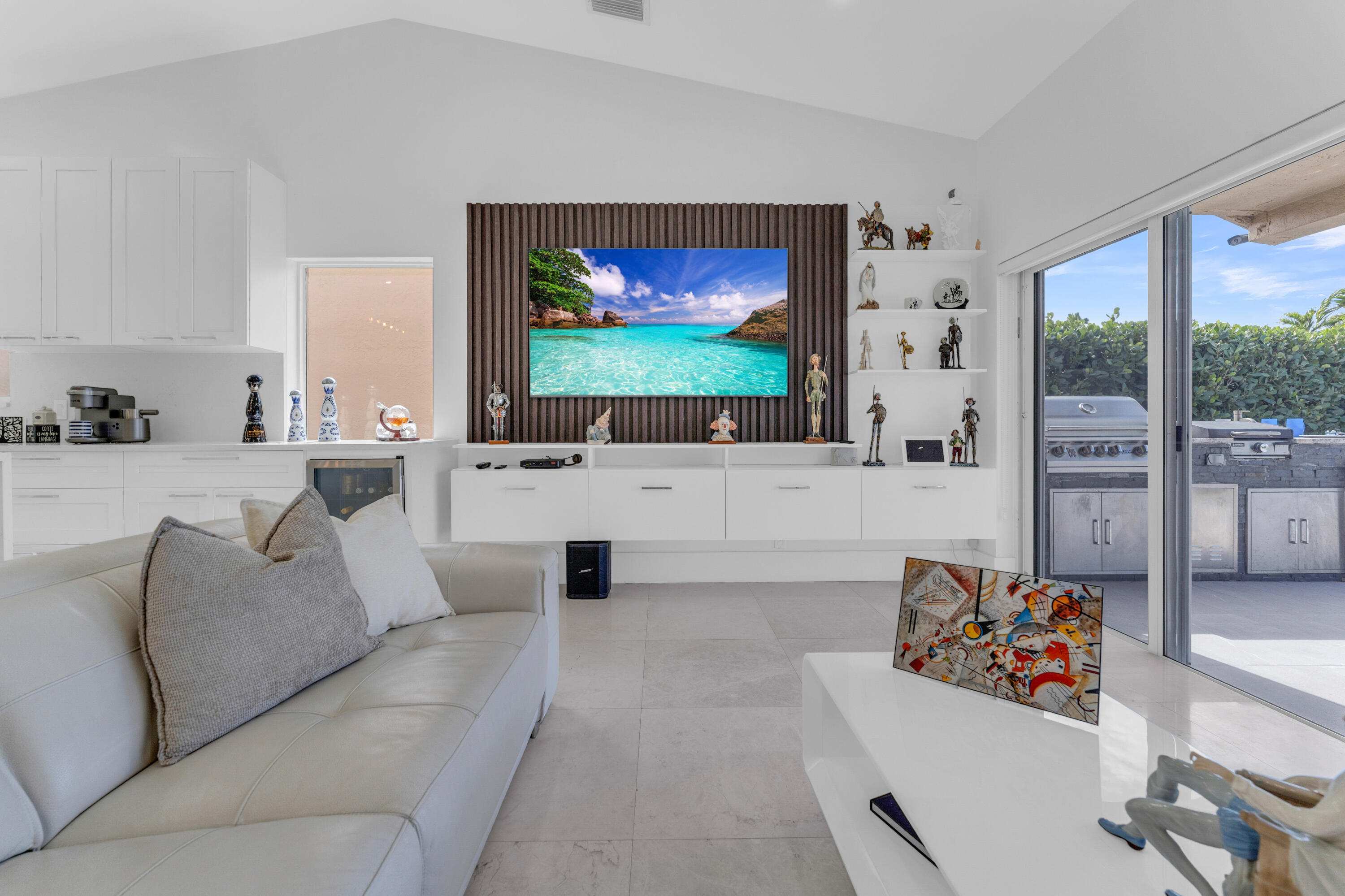 8024 Copenhagen Way Boca Raton, FL 33434 - Photo 15 of 69 a living room with furniture and a flat screen tv