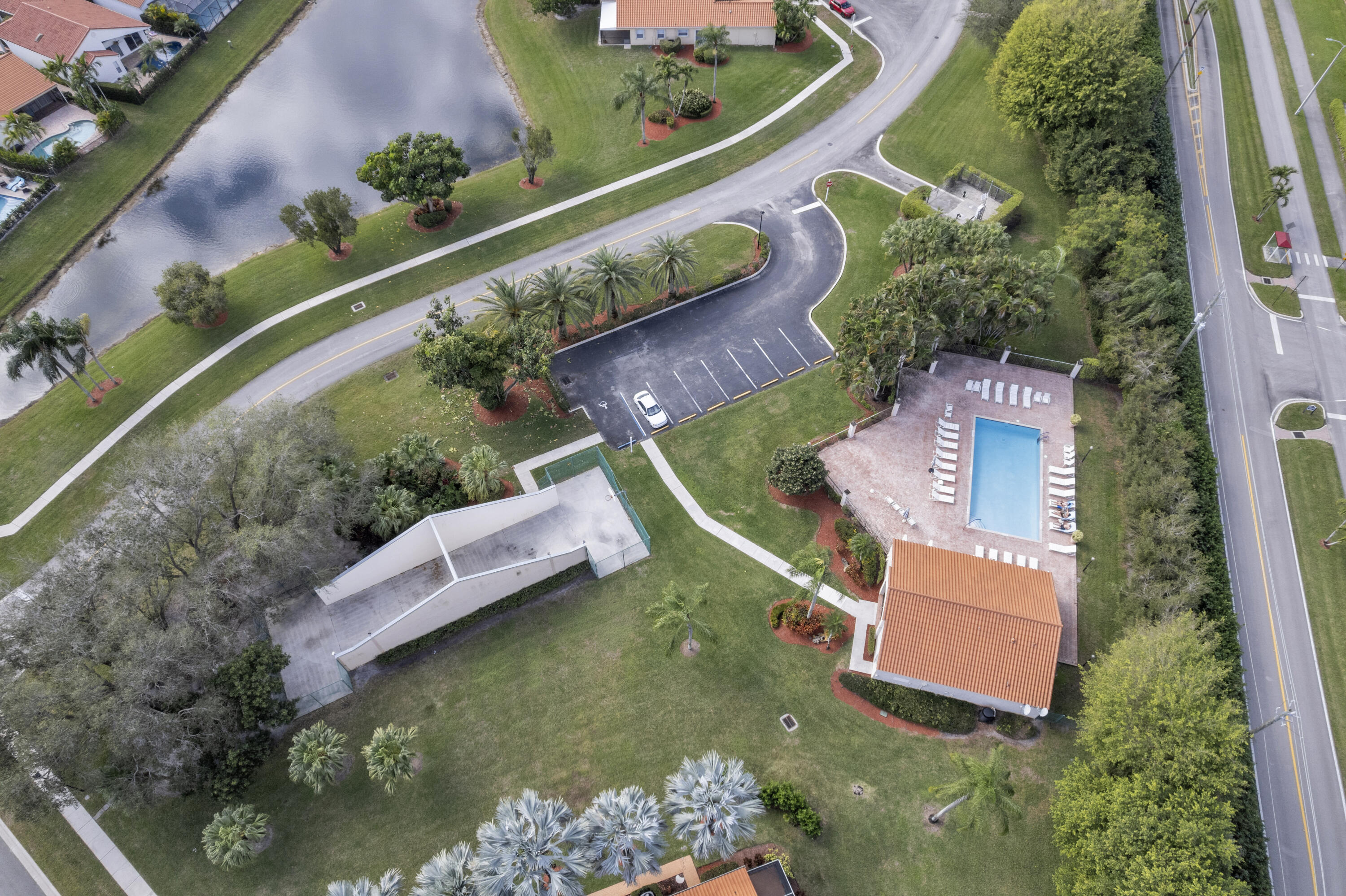 8024 Copenhagen Way Boca Raton, FL 33434 - Photo 66 of 69 an aerial view of a house with a garden and lake view