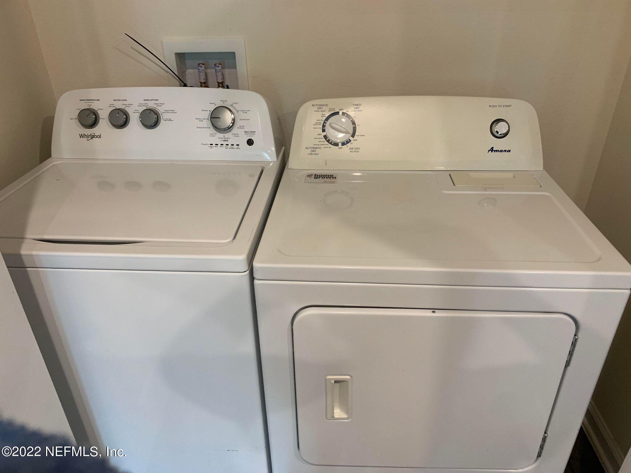 8023 Echo Springs Road Jacksonville, FL 32256 - Photo 6 of 9 a utility room with dryer and washer