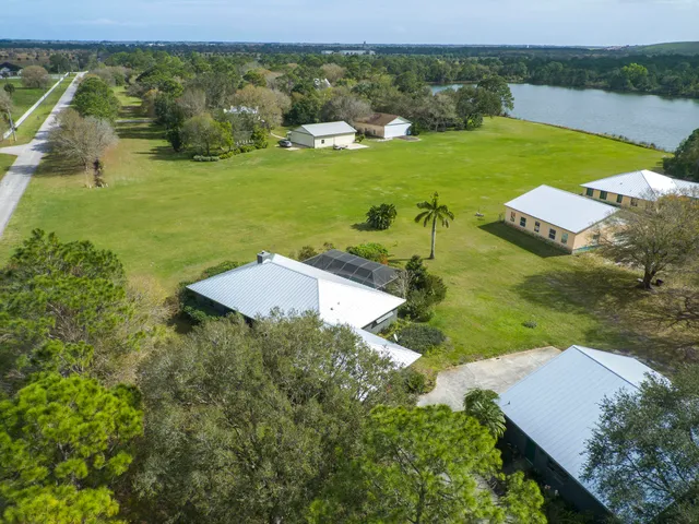 a view of a lake with a yard
