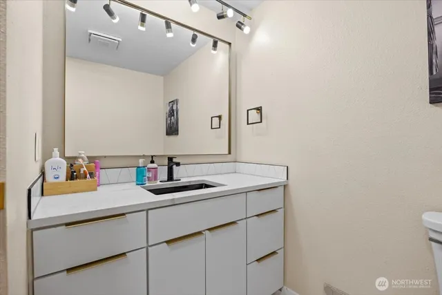 a view of a hallway with closet area