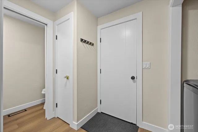 a view of a garage and car parked