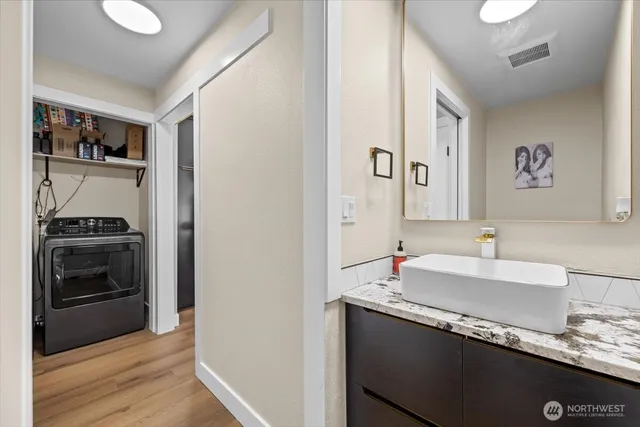 a living room with lots of furniture and cars
