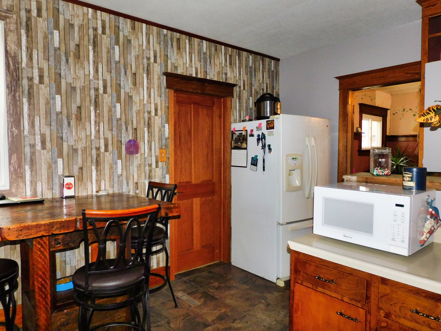 10797 West Fairmont Road Polo, IL 61064 - Photo 10 of 30 a dining room with furniture and a window