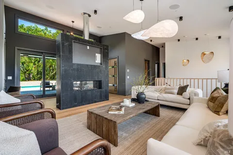 a kitchen with stainless steel appliances a sink stove and refrigerator