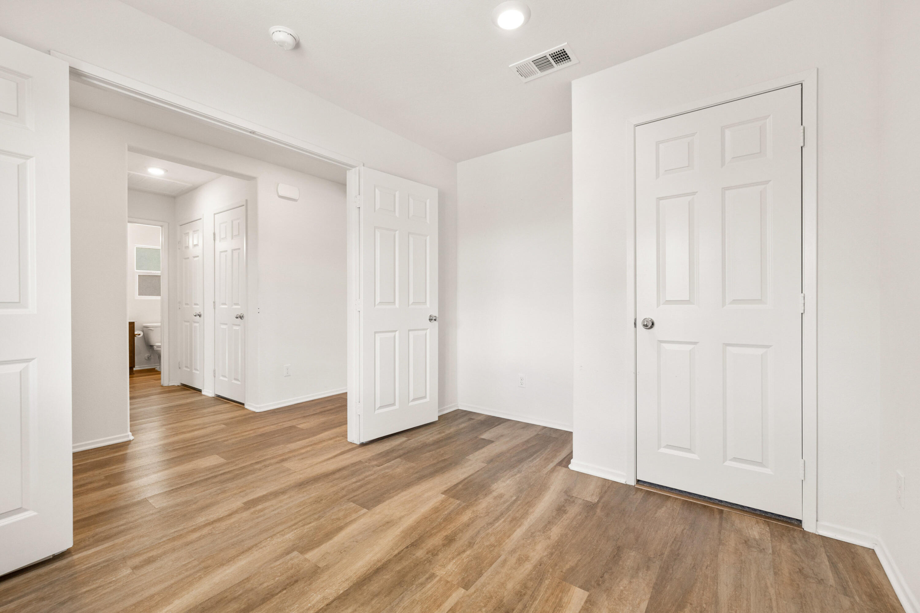 67364 Rio Plata Road Cathedral City, CA 92234 - Photo 12 of 49 wooden floor in an empty room