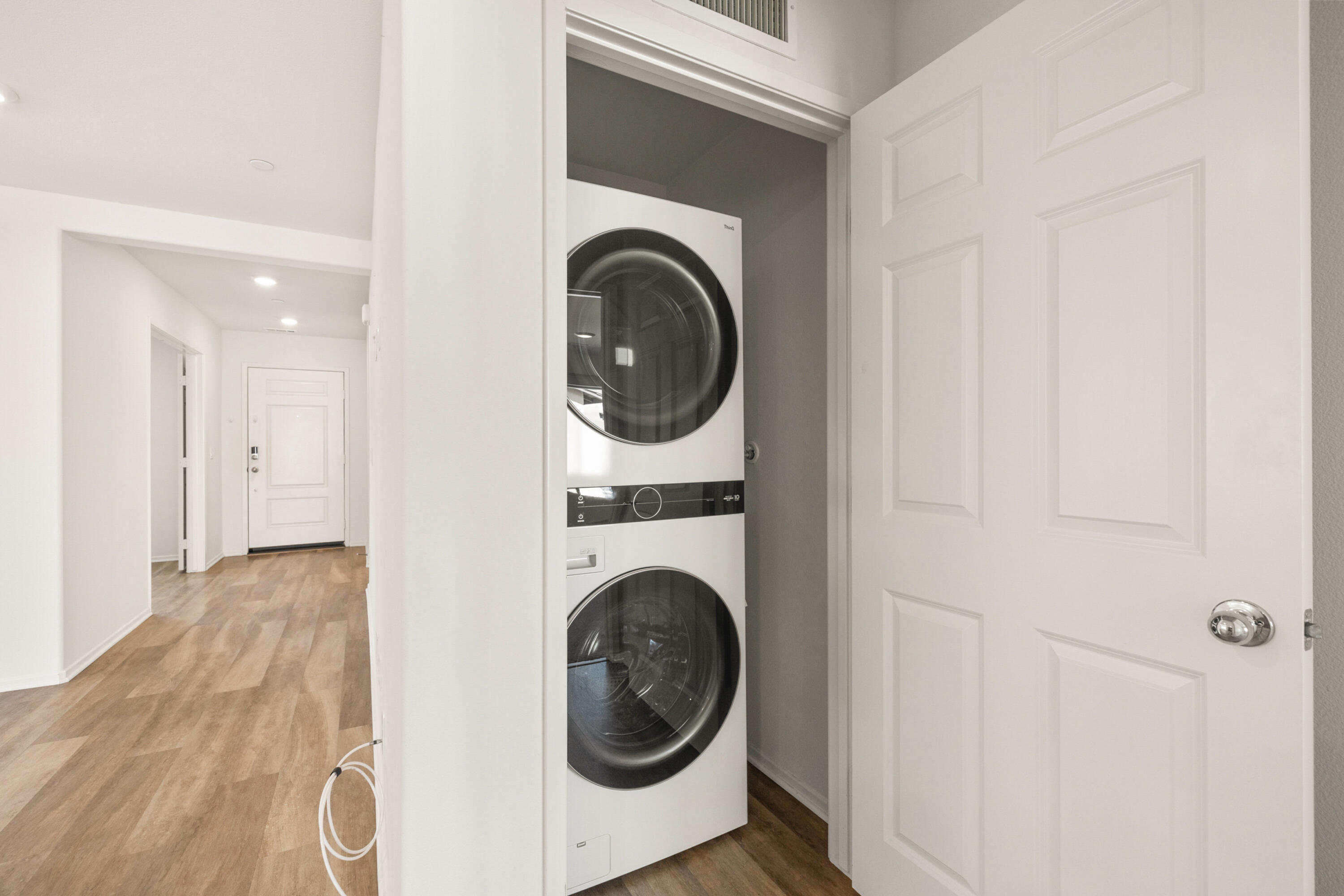 67364 Rio Plata Road Cathedral City, CA 92234 - Photo 19 of 49 a view of a hallway with washer and dryer