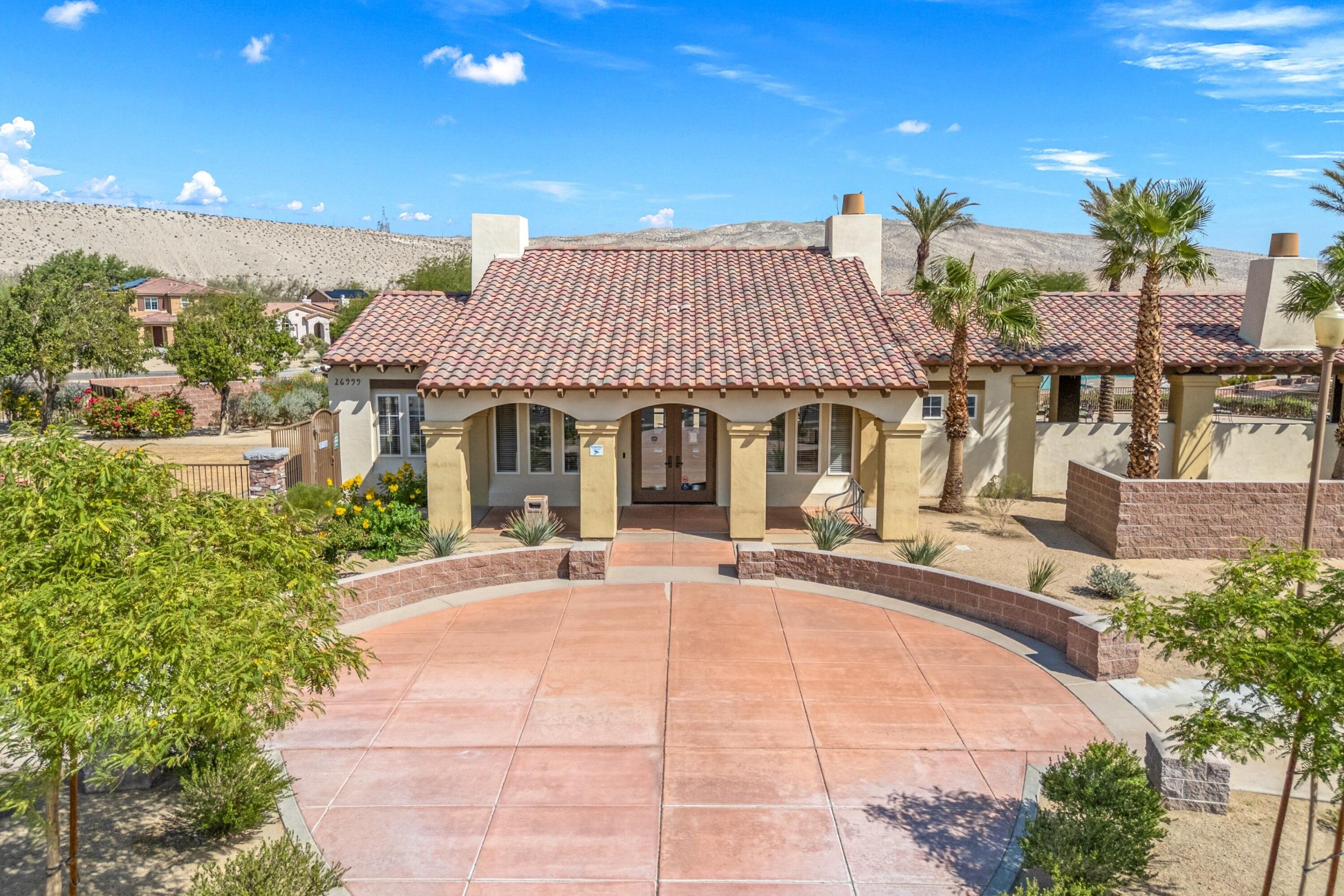 67364 Rio Plata Road Cathedral City, CA 92234 - Photo 34 of 49 a front view of a house with a garden
