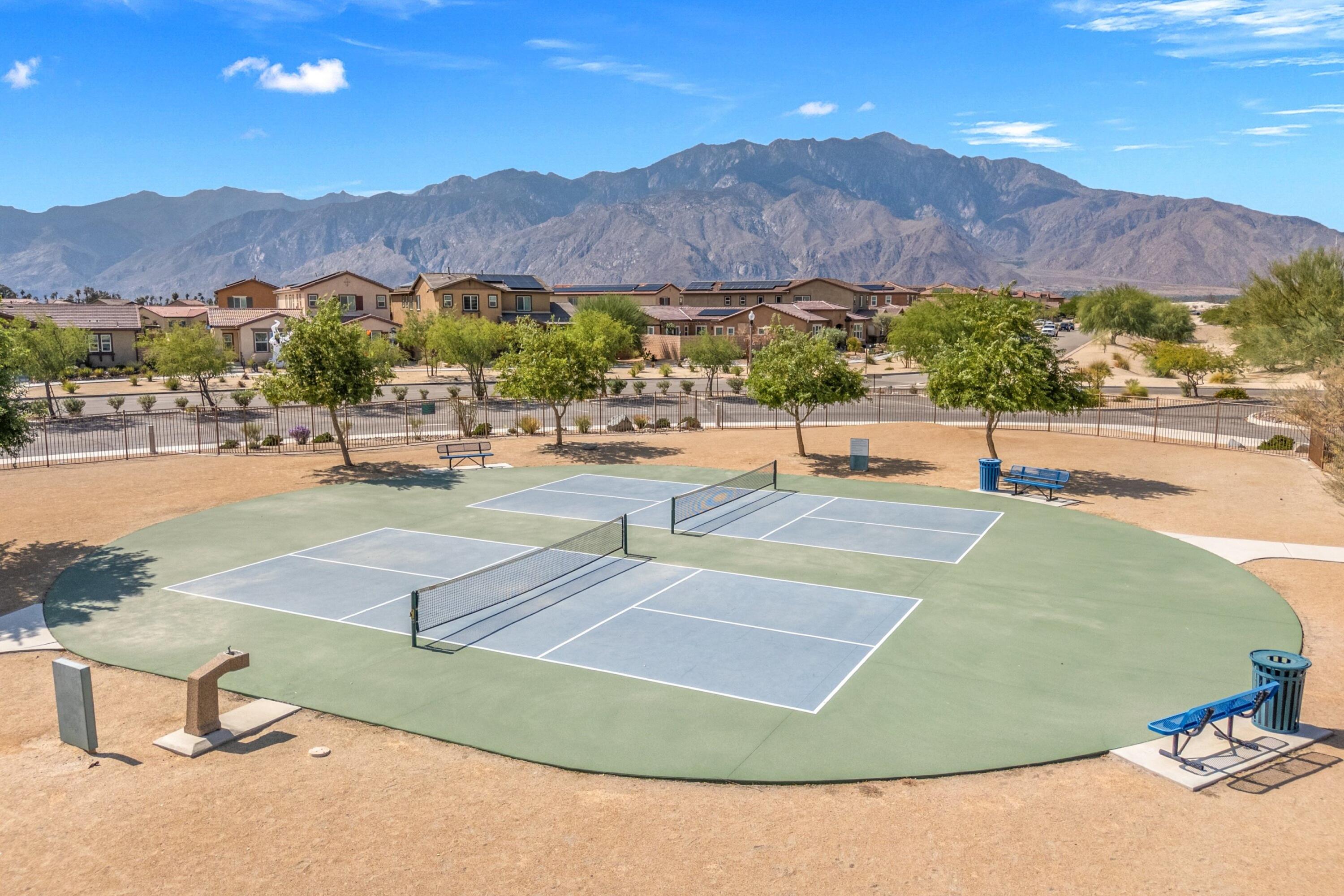 67364 Rio Plata Road Cathedral City, CA 92234 - Photo 36 of 49 a view of a swimming pool and mountains