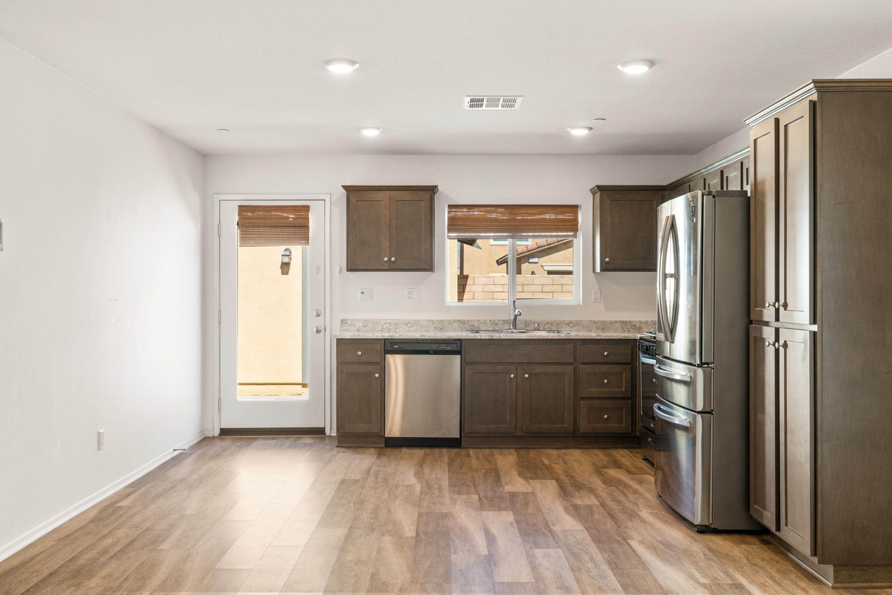 67364 Rio Plata Road Cathedral City, CA 92234 - Photo 38 of 49 a large kitchen with a refrigerator and a sink