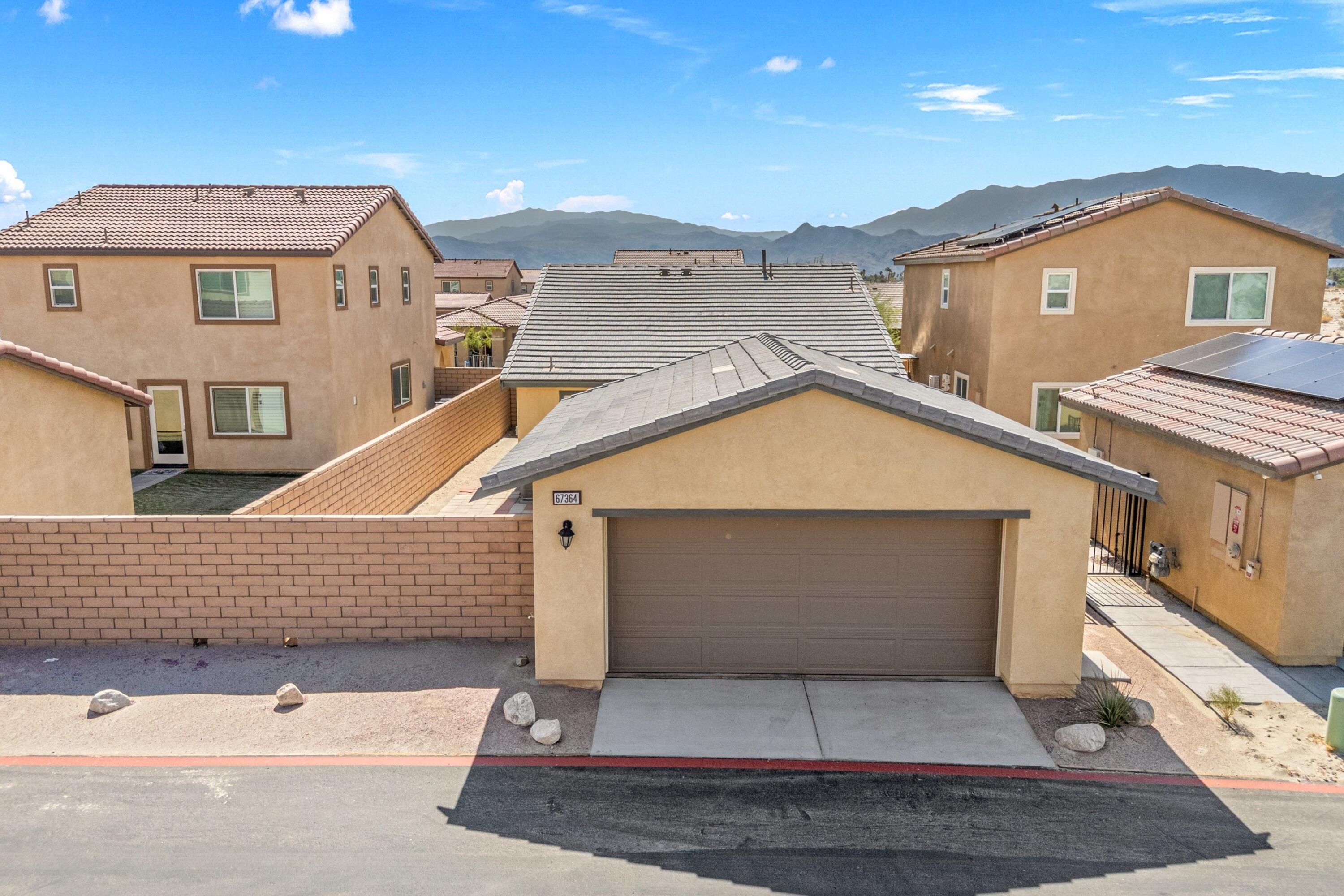 67364 Rio Plata Road Cathedral City, CA 92234 - Photo 46 of 49 a front view of a house with a yard
