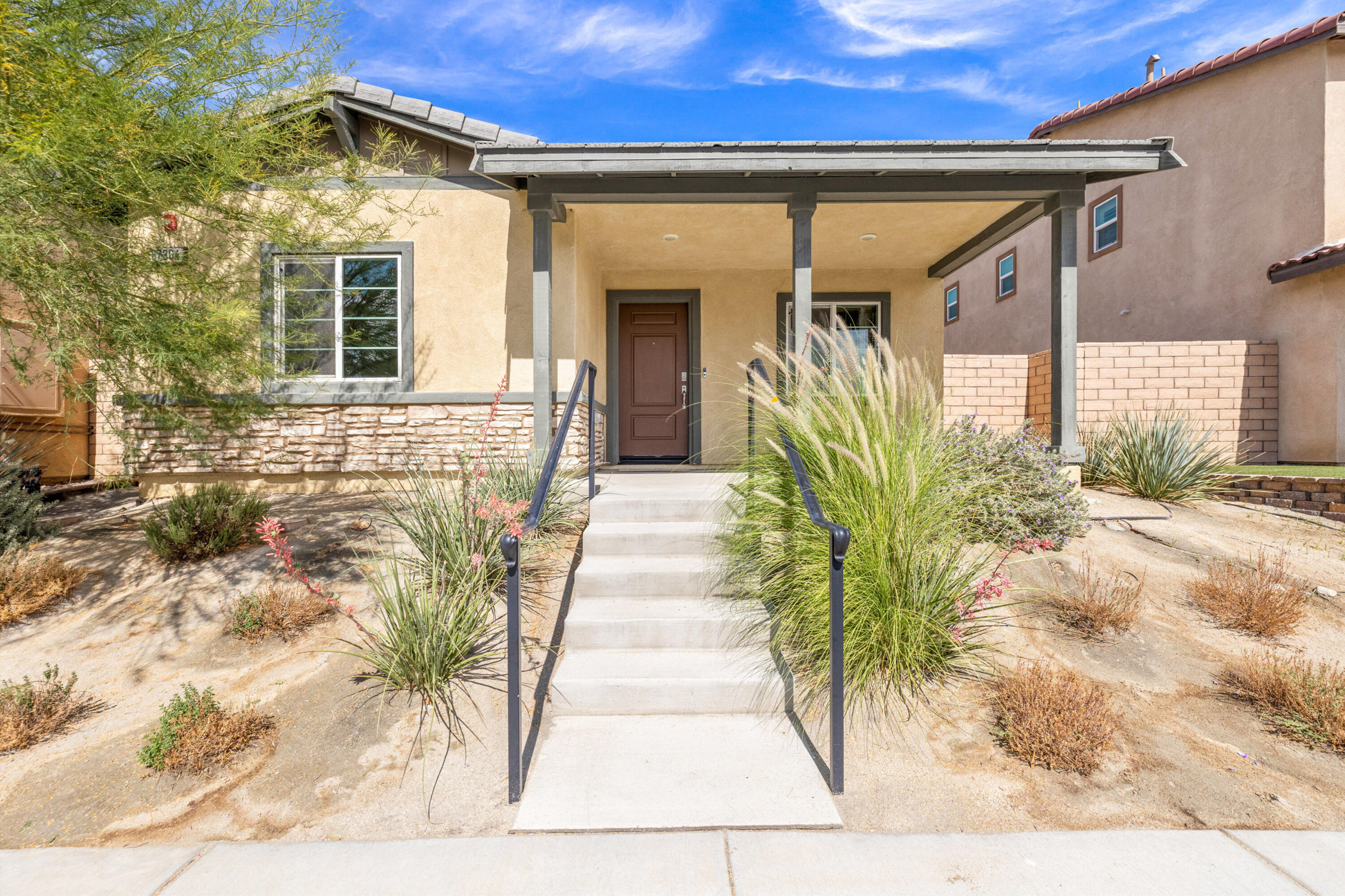 67364 Rio Plata Road Cathedral City, CA 92234 - Photo 8 of 49 a front view of a house