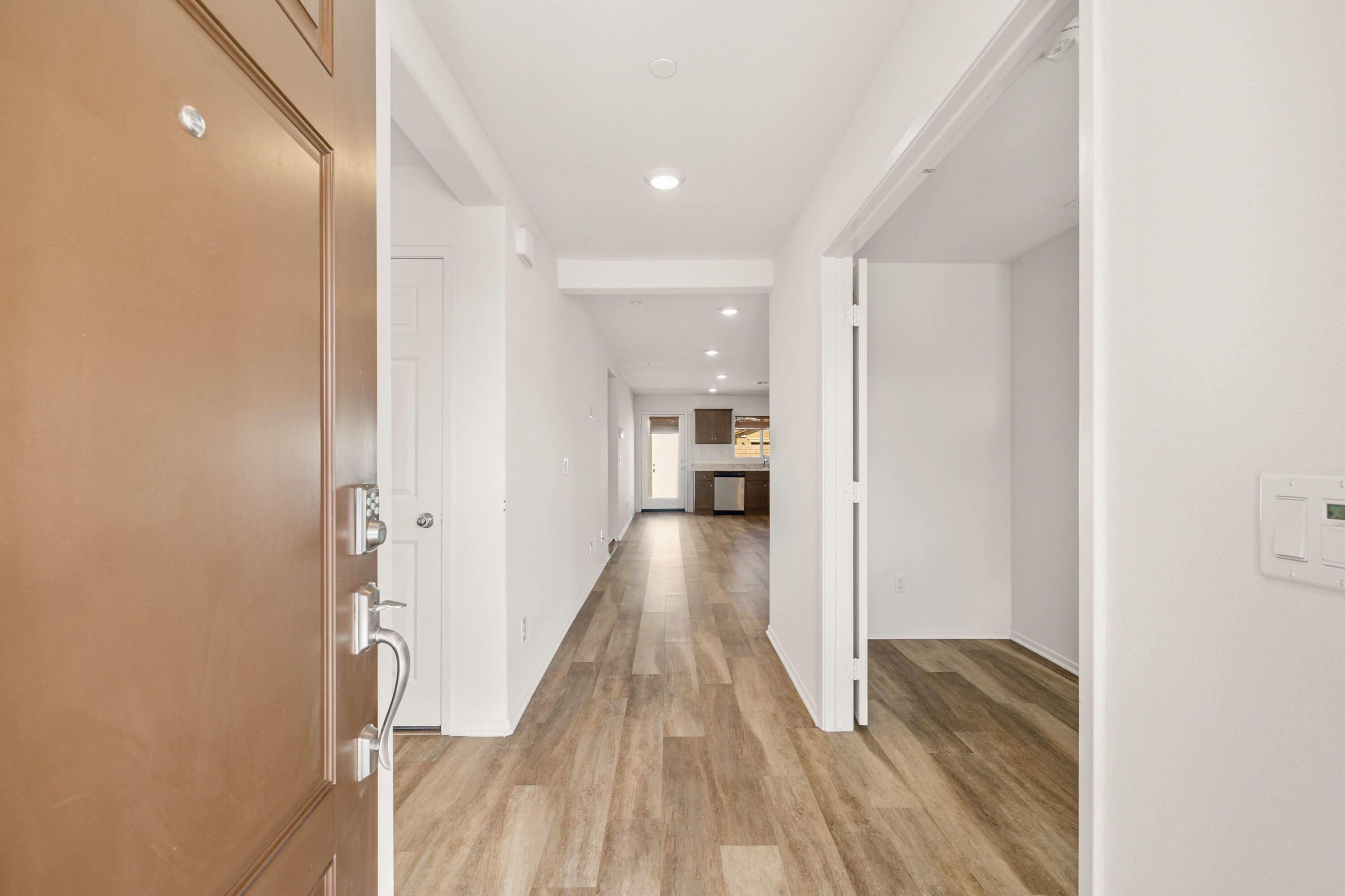 67364 Rio Plata Road Cathedral City, CA 92234 - Photo 10 of 49 a view of a hallway with wooden floor
