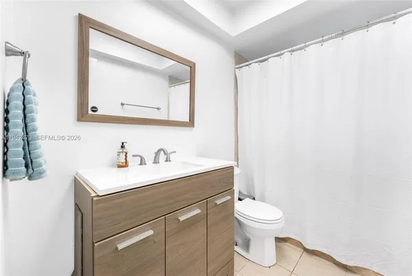 a room with a bed and a window