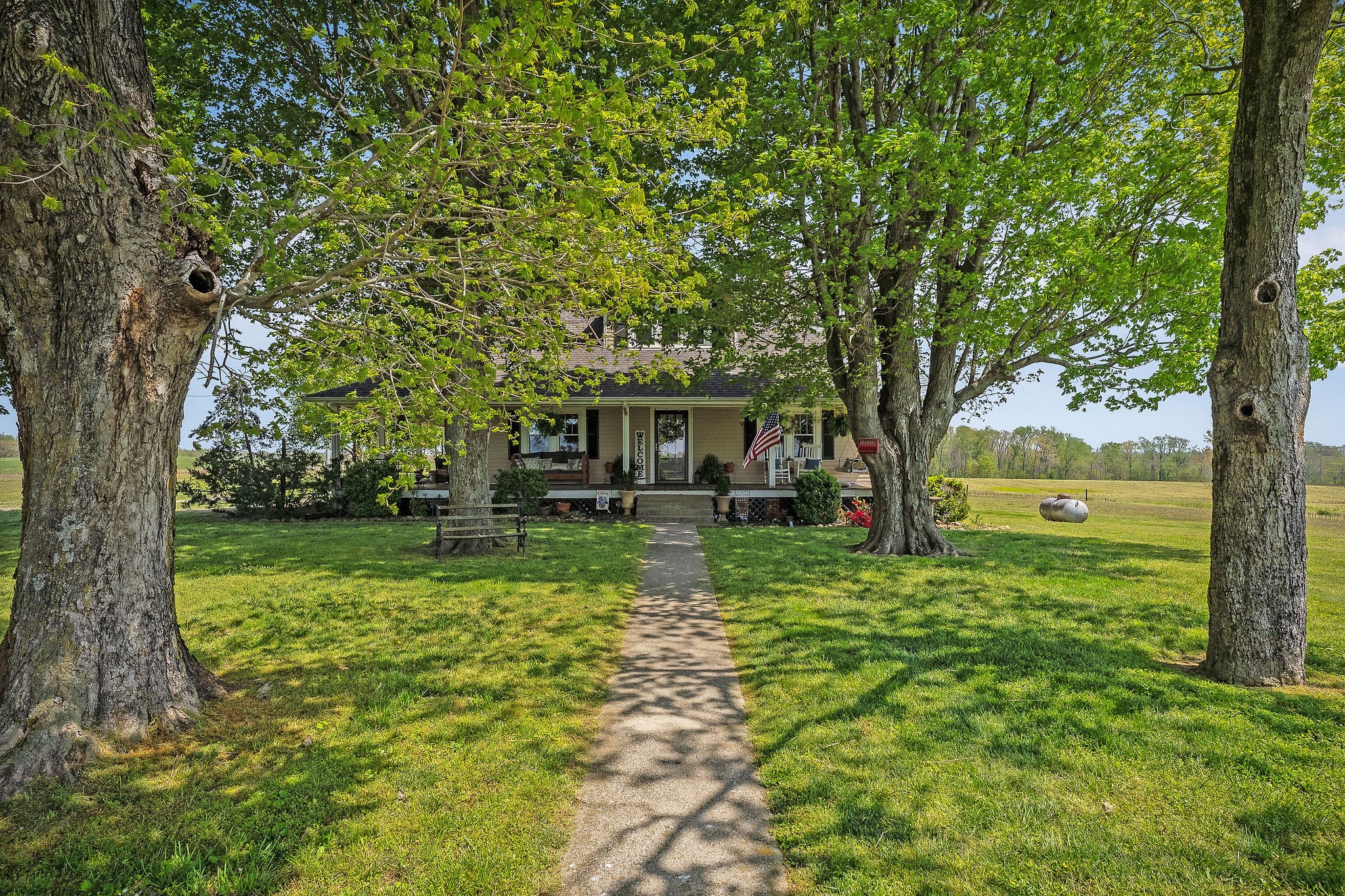 77 McAfee Lane Morrison, TN 37357 - Photo 1 of 39 a view of house with a backyard