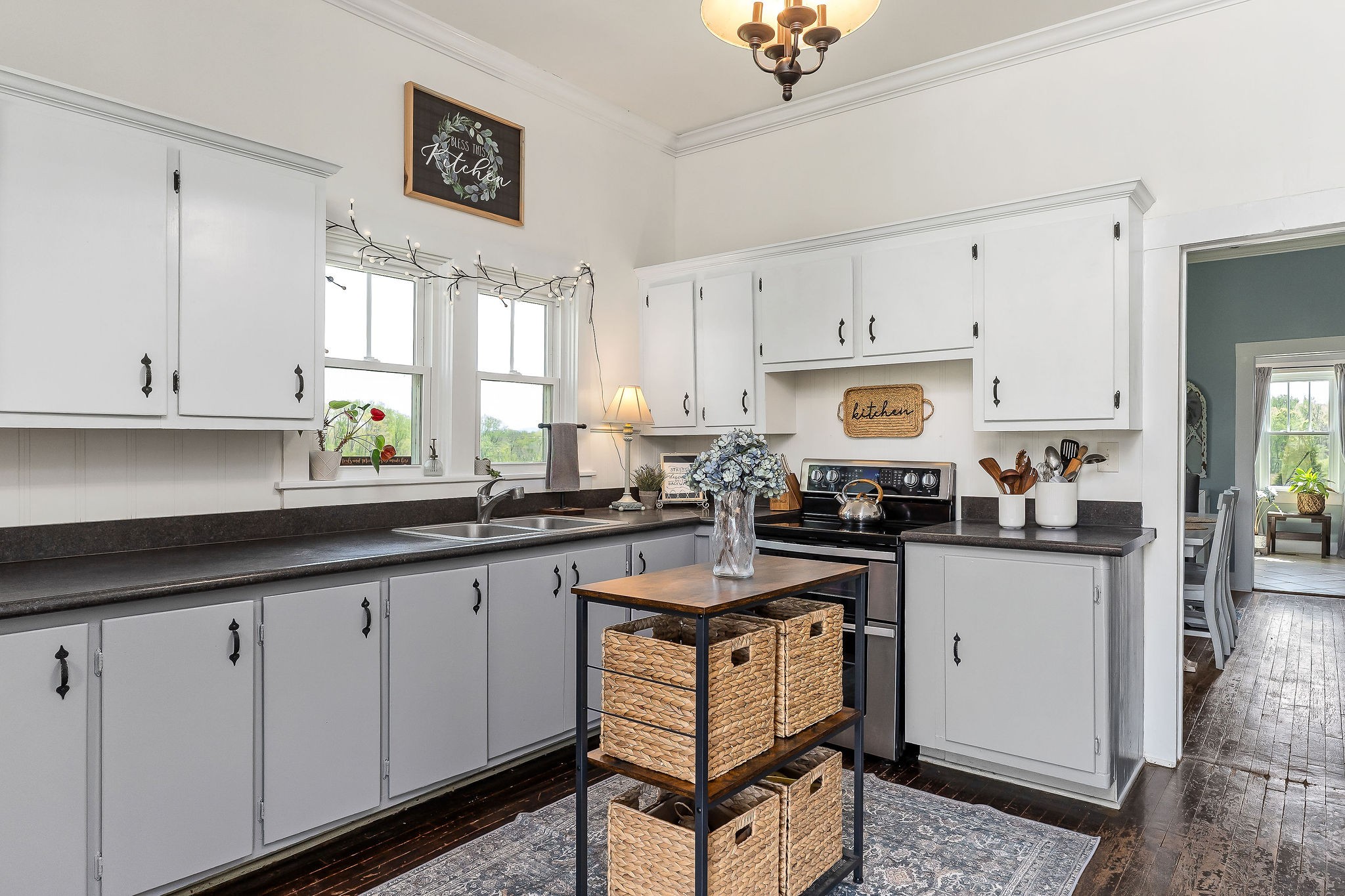 77 McAfee Lane Morrison, TN 37357 - Photo 16 of 39 a kitchen with granite countertop white cabinets and white appliances