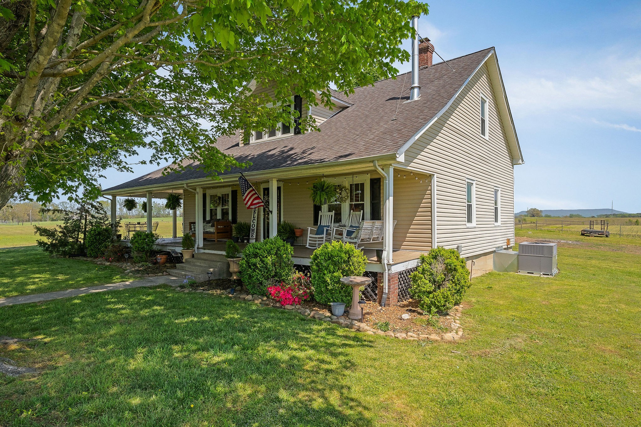 77 McAfee Lane Morrison, TN 37357 - Photo 3 of 39 a front view of house with yard and green space