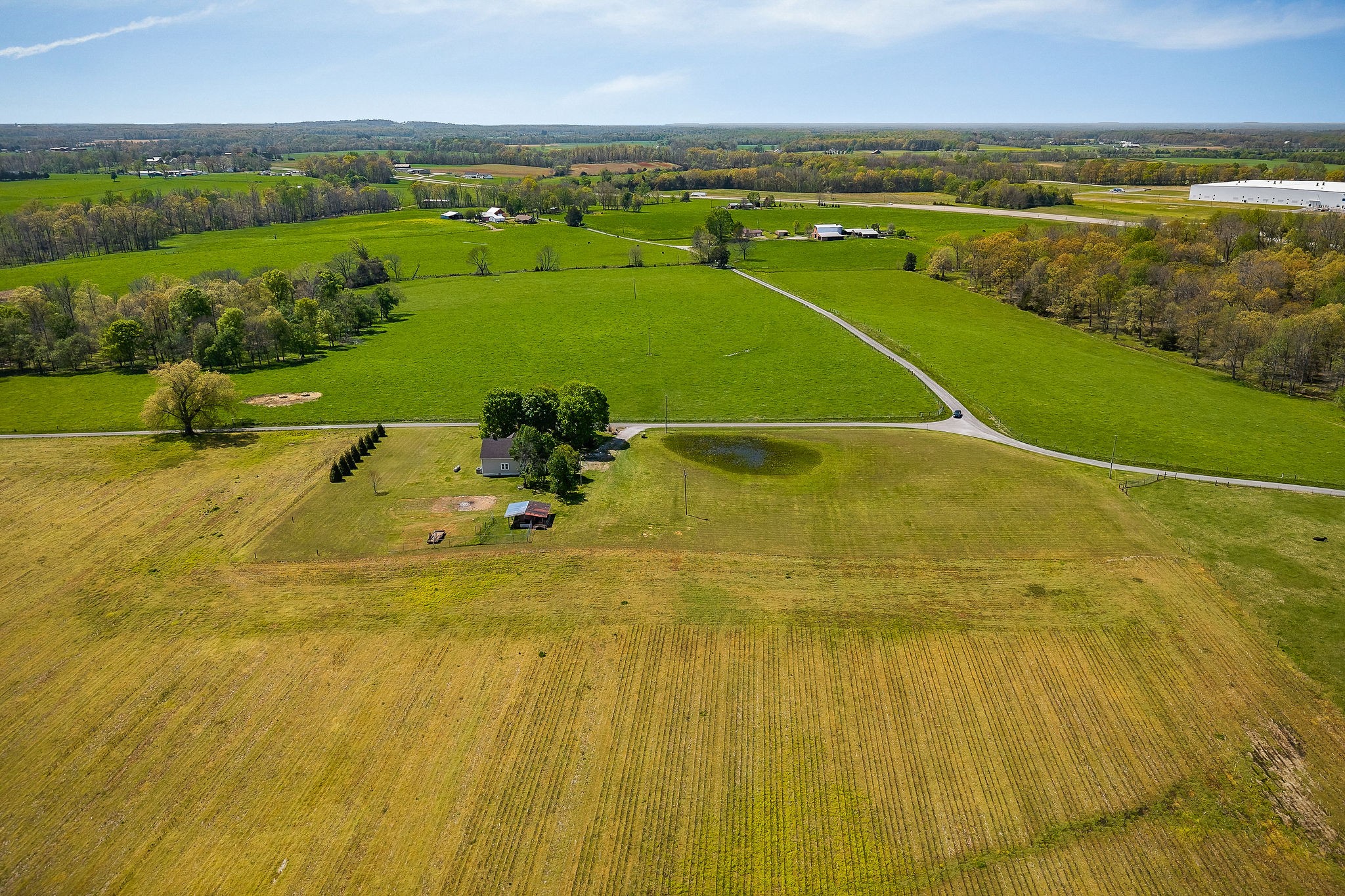 77 McAfee Lane Morrison, TN 37357 - Photo 35 of 39 a view of an outdoor space and tennis court