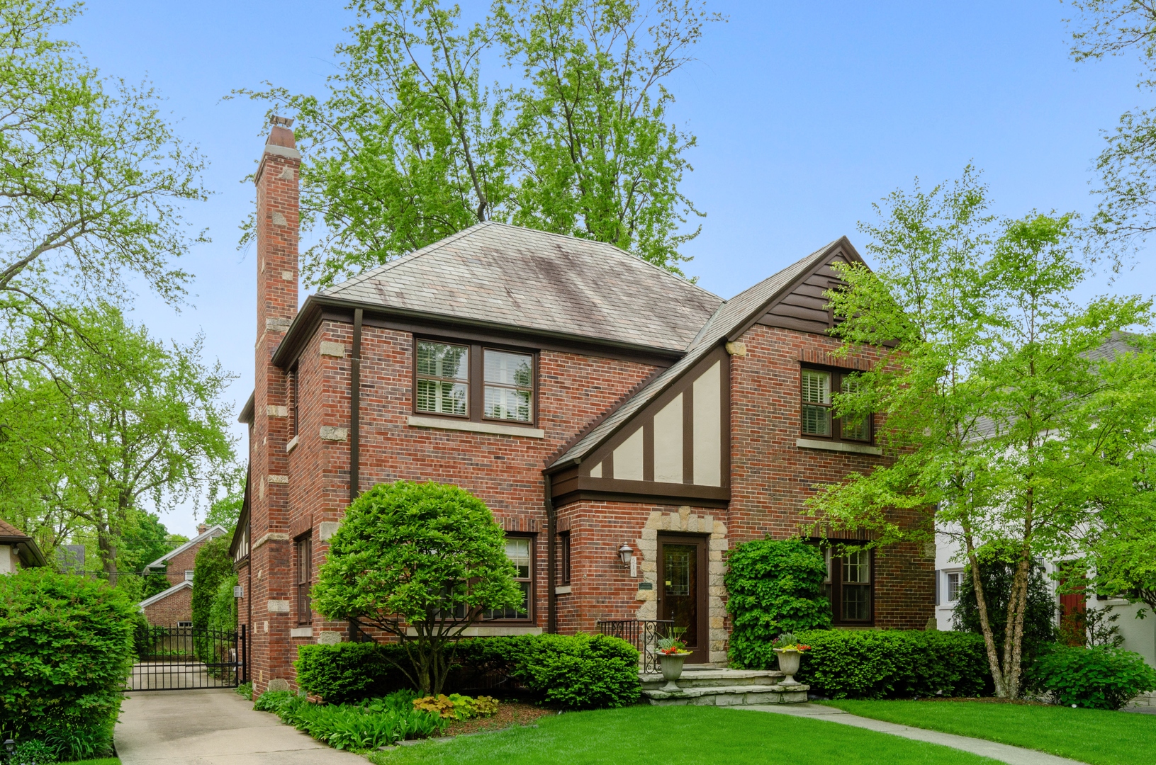 514 Meadow Road Winnetka, IL 60093 - Photo 1 of 31 front view of a house with a yard