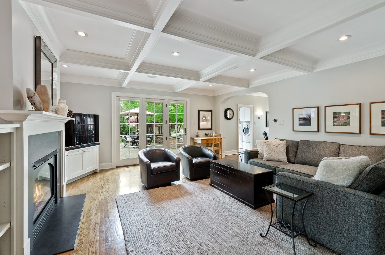 514 Meadow Road Winnetka, IL 60093 - Photo 12 of 31 a living room with fireplace furniture and a flat screen tv