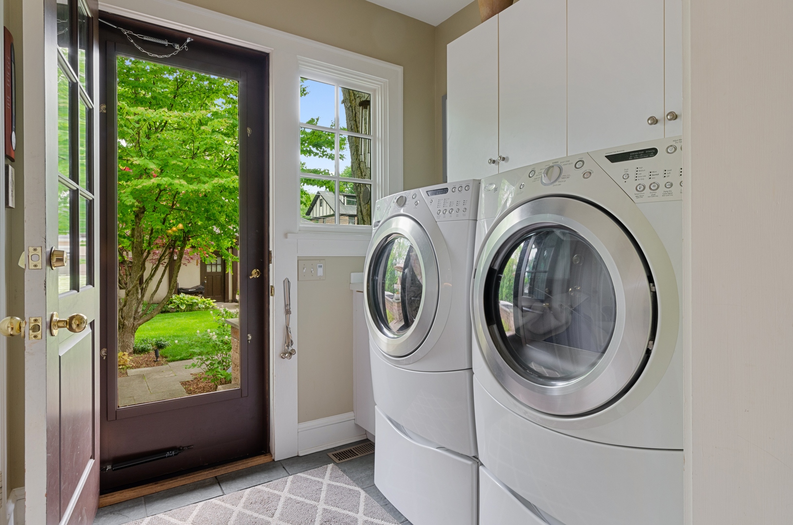 514 Meadow Road Winnetka, IL 60093 - Photo 13 of 31 a utility room with dryer and washer
