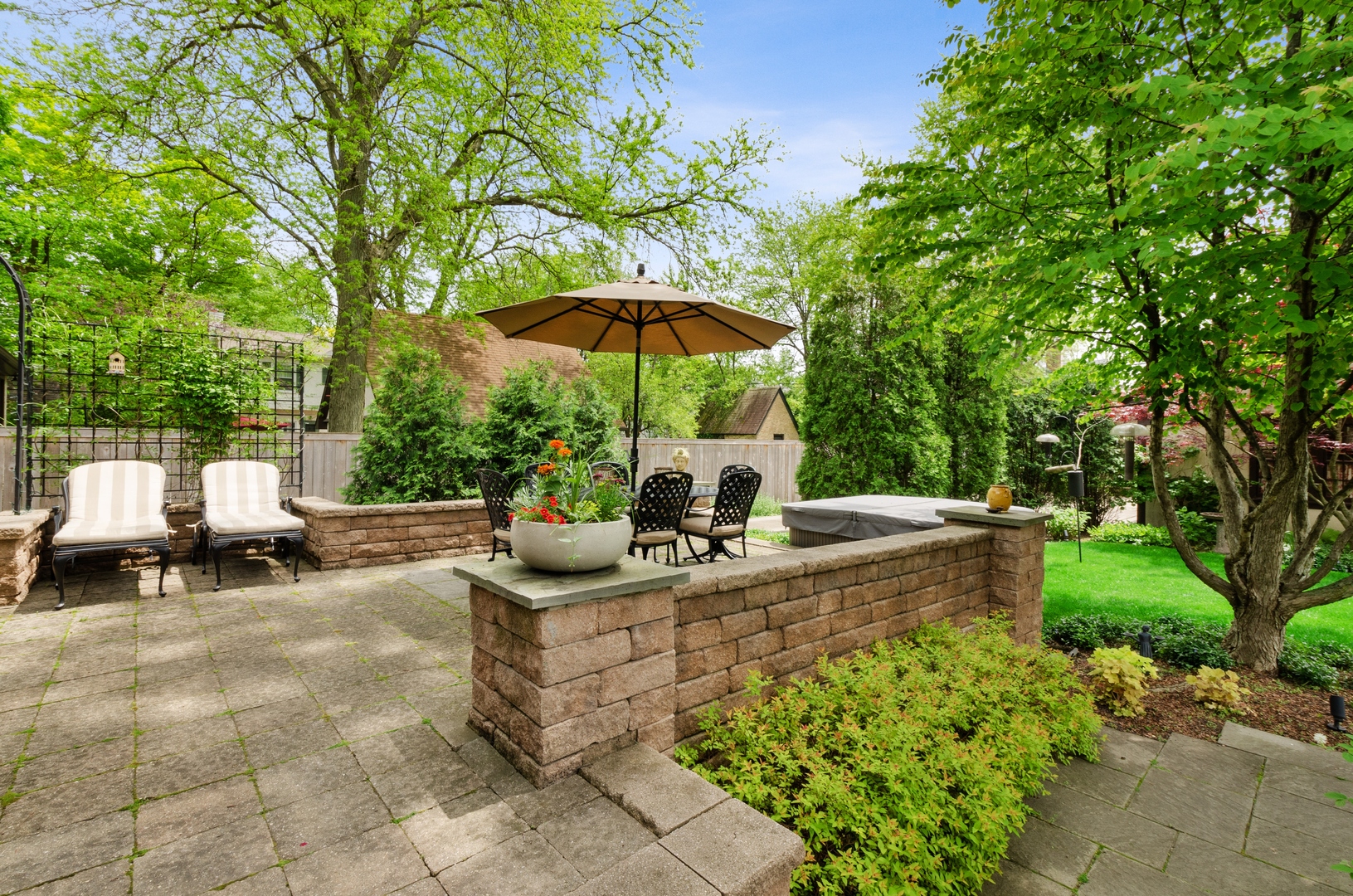 514 Meadow Road Winnetka, IL 60093 - Photo 24 of 31 a view of a backyard with sitting area and furniture