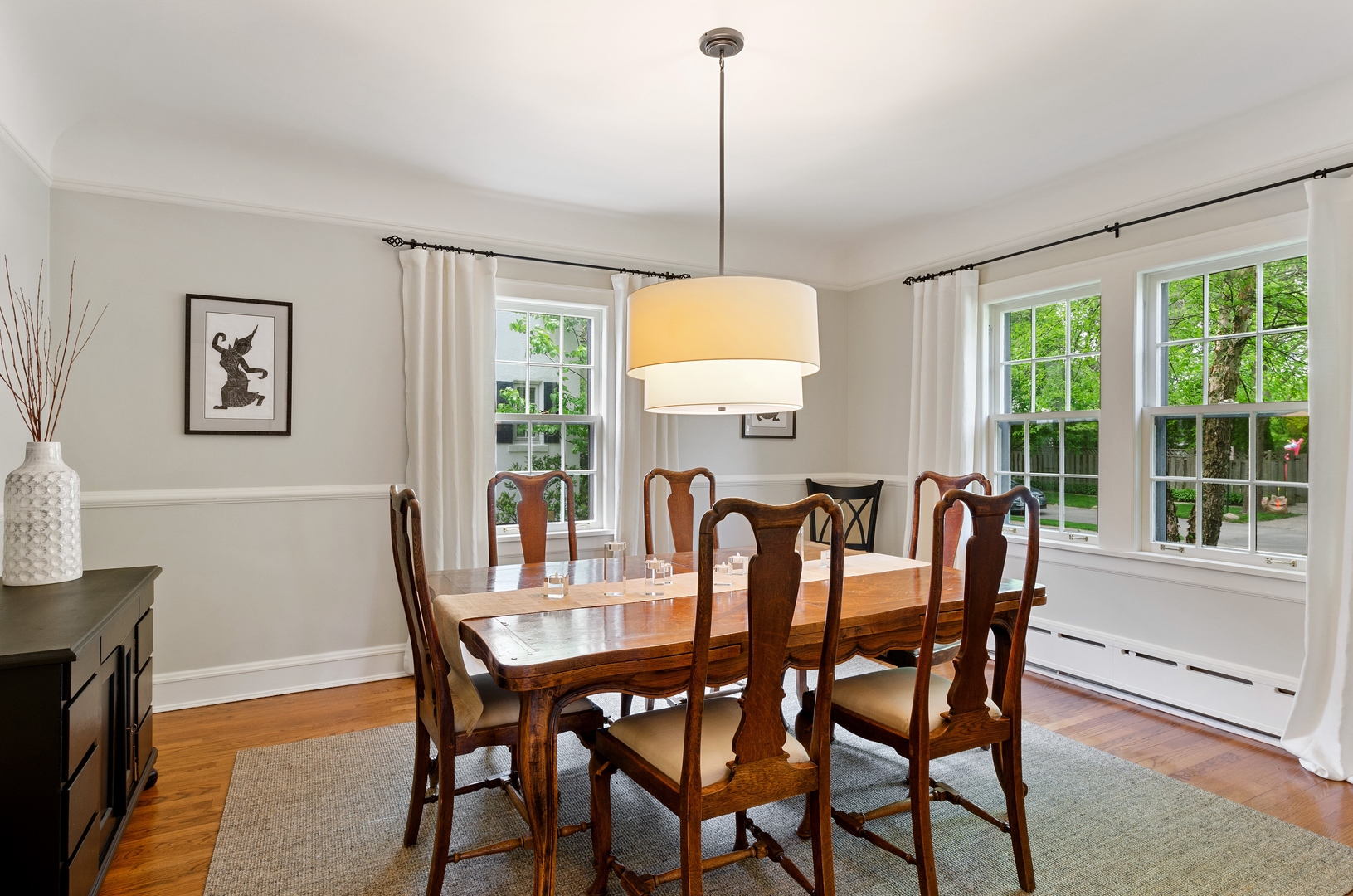 514 Meadow Road Winnetka, IL 60093 - Photo 5 of 31 a view of a dining room with furniture window and outside view