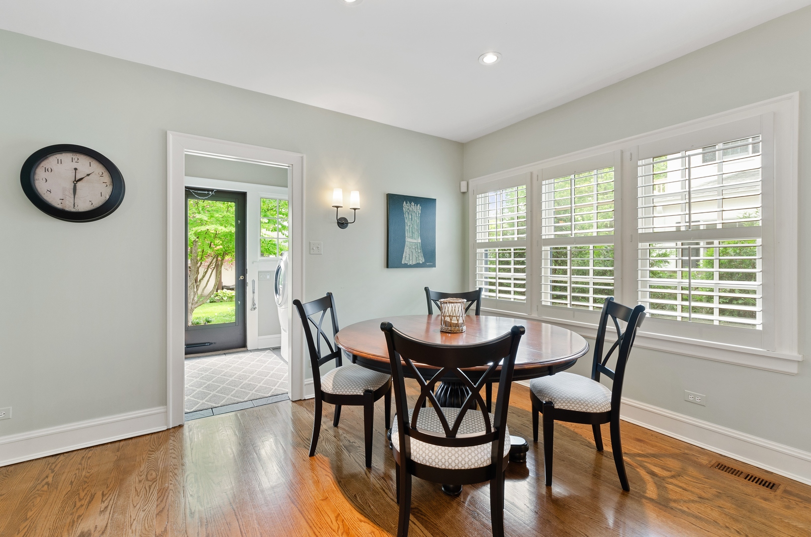 514 Meadow Road Winnetka, IL 60093 - Photo 9 of 31 a view of a dining room with furniture window and wooden floor