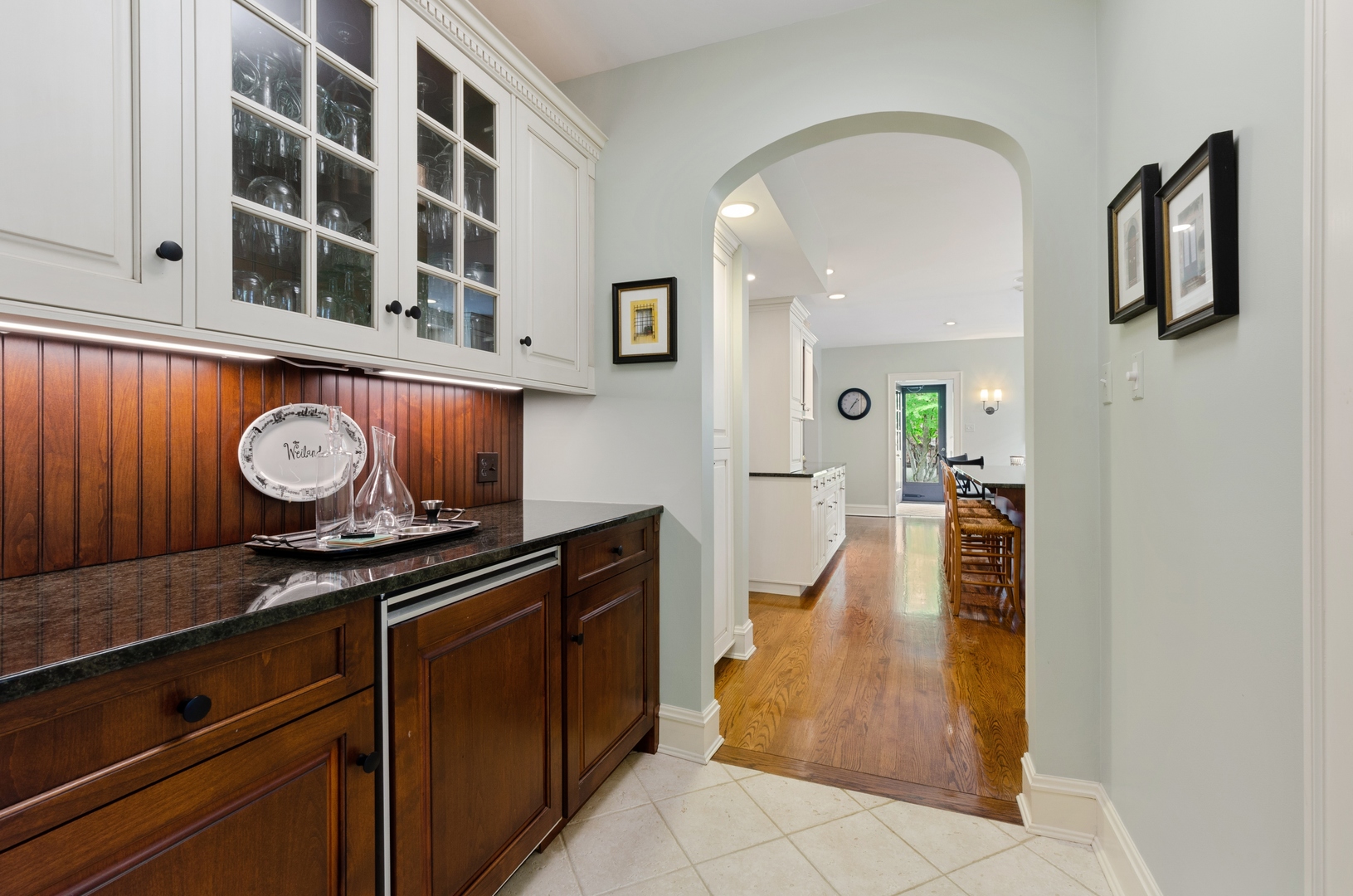514 Meadow Road Winnetka, IL 60093 - Photo 10 of 31 a kitchen with stainless steel appliances granite countertop a coffee maker on the counter and cabinets