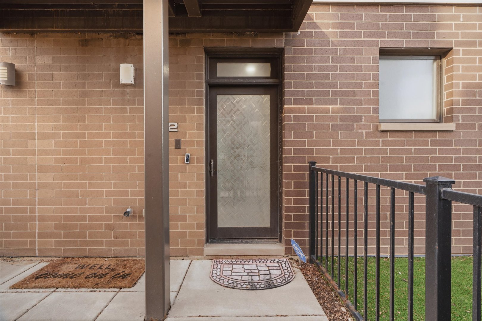 648 West 16th Street, Unit 2 Chicago, IL 60616 - Photo 11 of 19 a view of a brick house that has an door