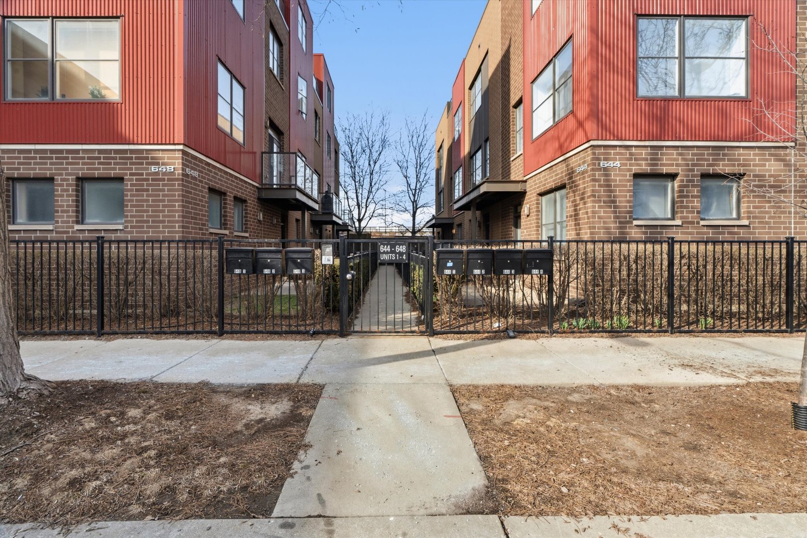 648 West 16th Street, Unit 2 Chicago, IL 60616 - Photo 12 of 19 a view of a building with brick walls