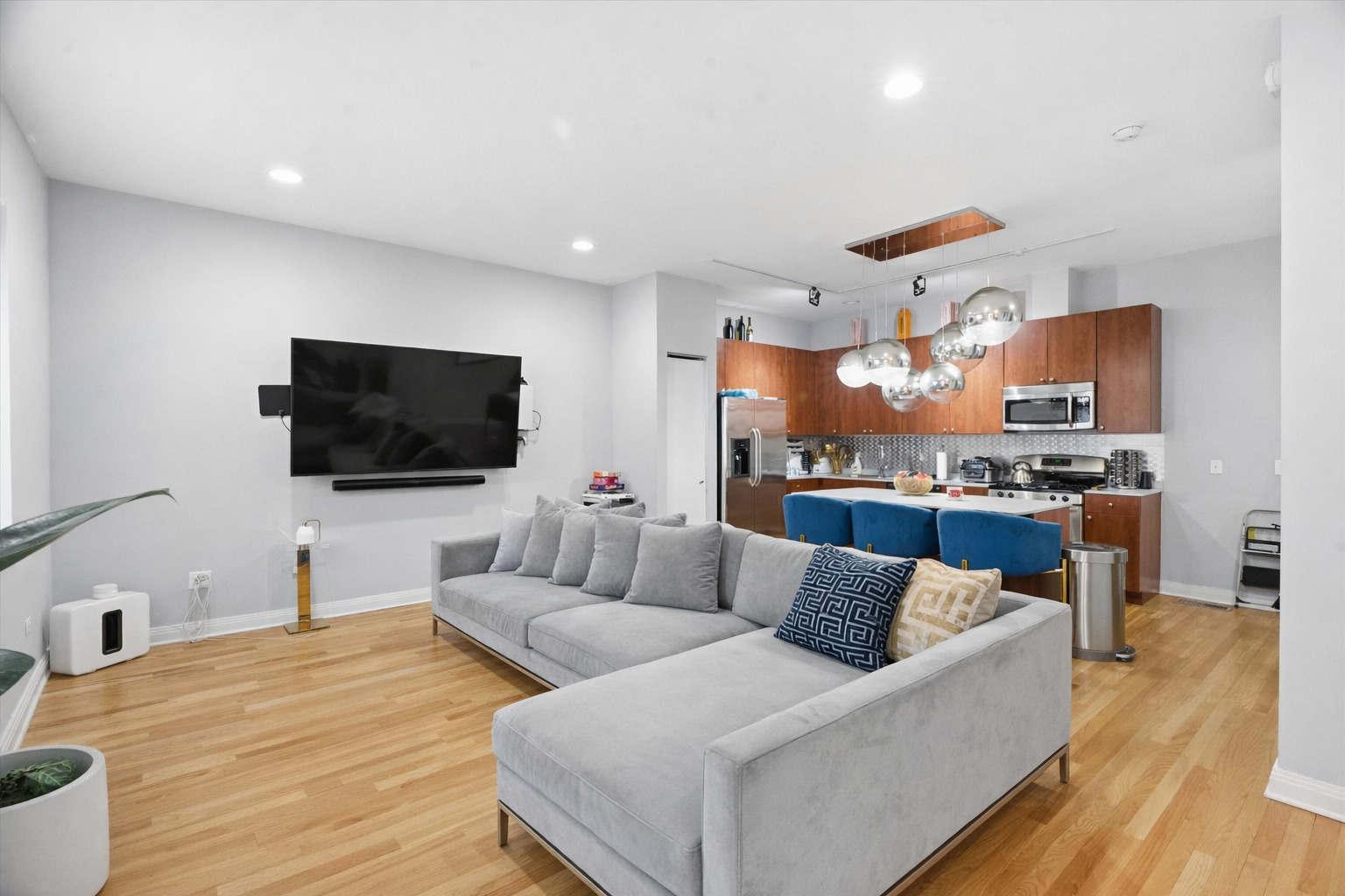648 West 16th Street, Unit 2 Chicago, IL 60616 - Photo 14 of 19 a living room with furniture and a flat screen tv