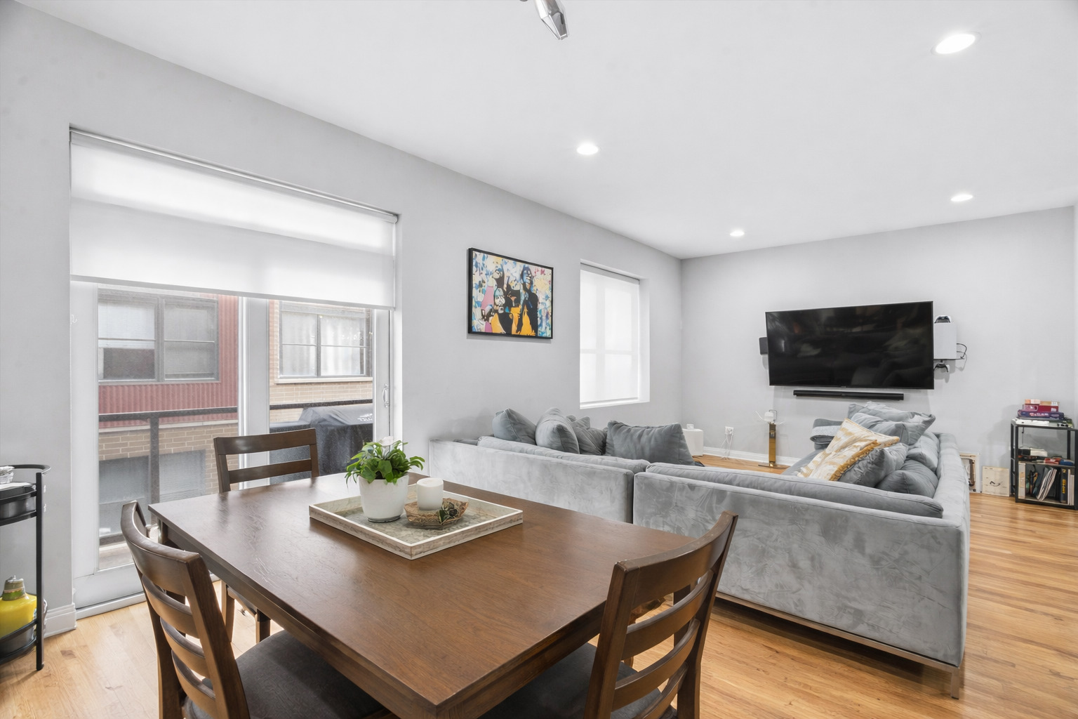 648 West 16th Street, Unit 2 Chicago, IL 60616 - Photo 15 of 19 a living room with furniture and a flat screen tv