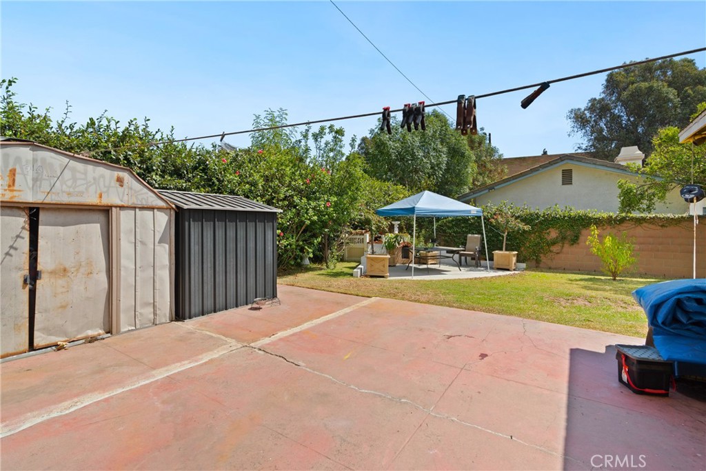 4633 Leonis Street Commerce, CA 90040 - Photo 21 of 30 a view of a house with backyard and sitting area