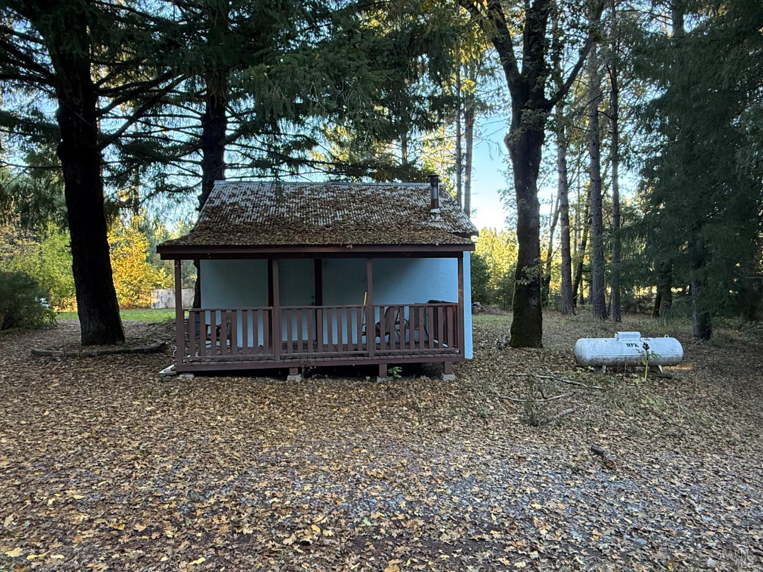 770 Branscomb Road Laytonville, CA 95454 - Photo 20 of 42 a view of a house with a yard and sitting area