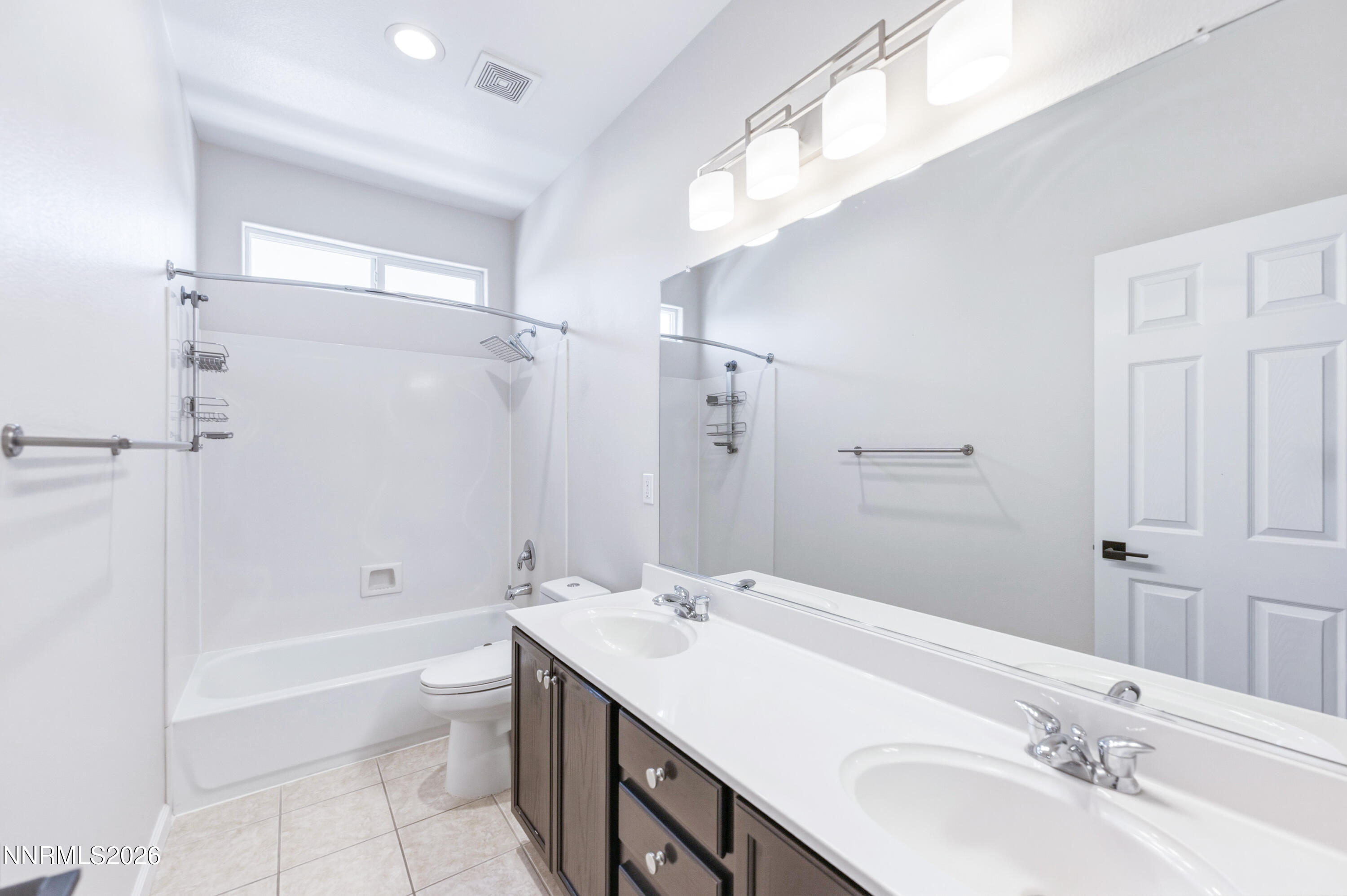 1770 Kodiak Circle Reno, NV 89511 - Photo 24 of 32 a bathroom with a sink a toilet and shower