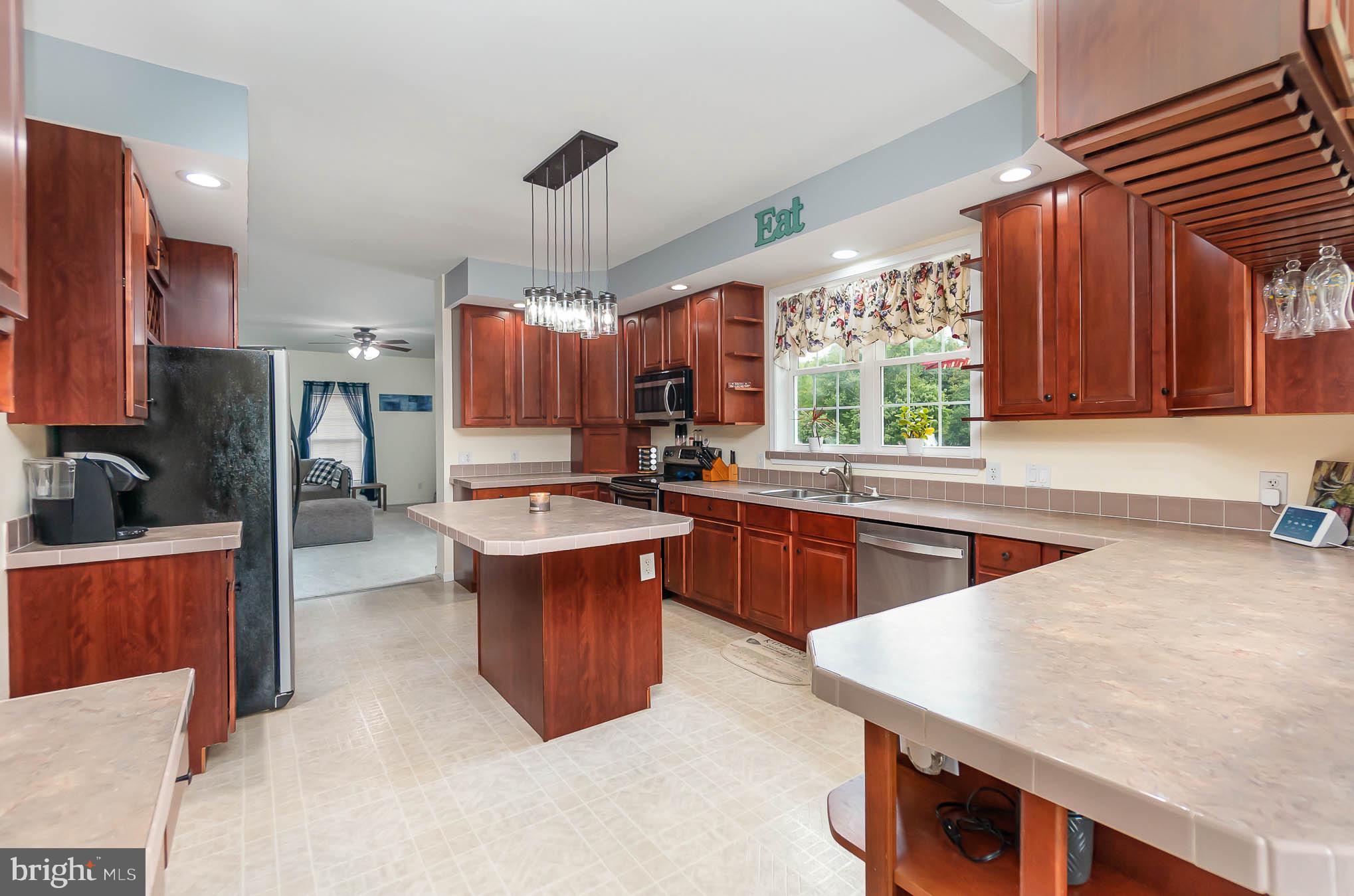 827 Seneca Park Road Middle River, MD 21220 - Photo 21 of 49 Kitchen with Stainless Steel Appliances