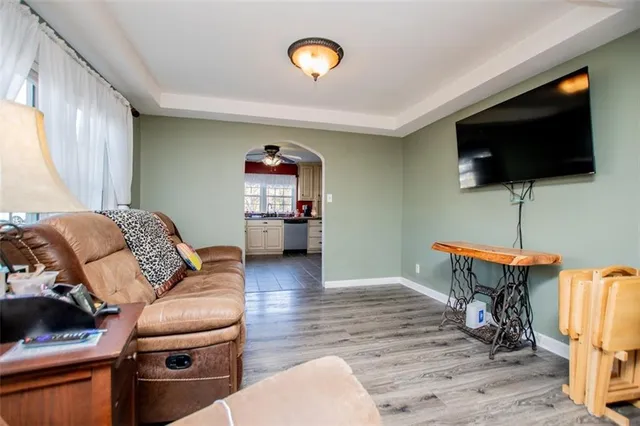 a view of a red door and small trees